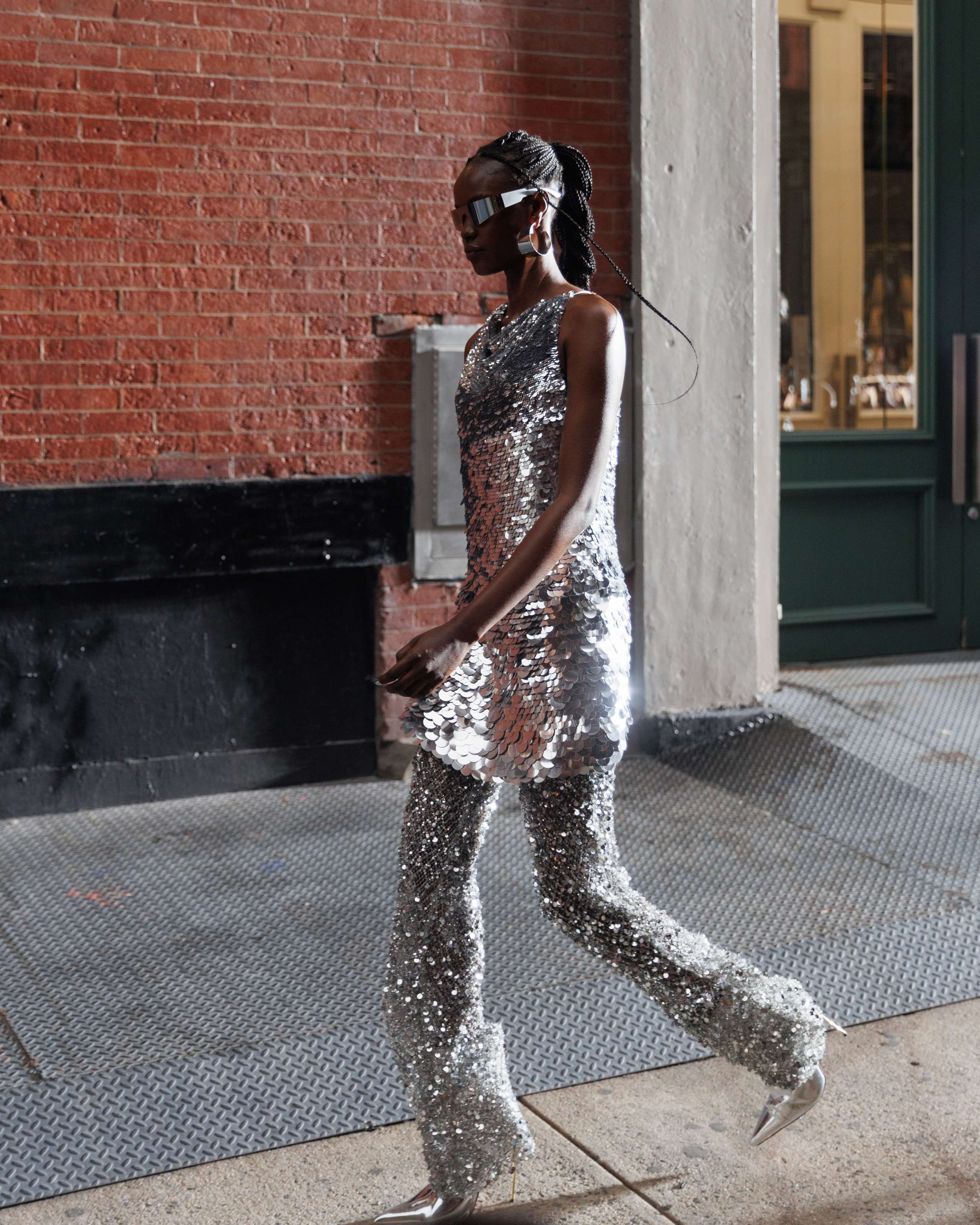 Runway model in metallic sequin gown – NYC fashion show