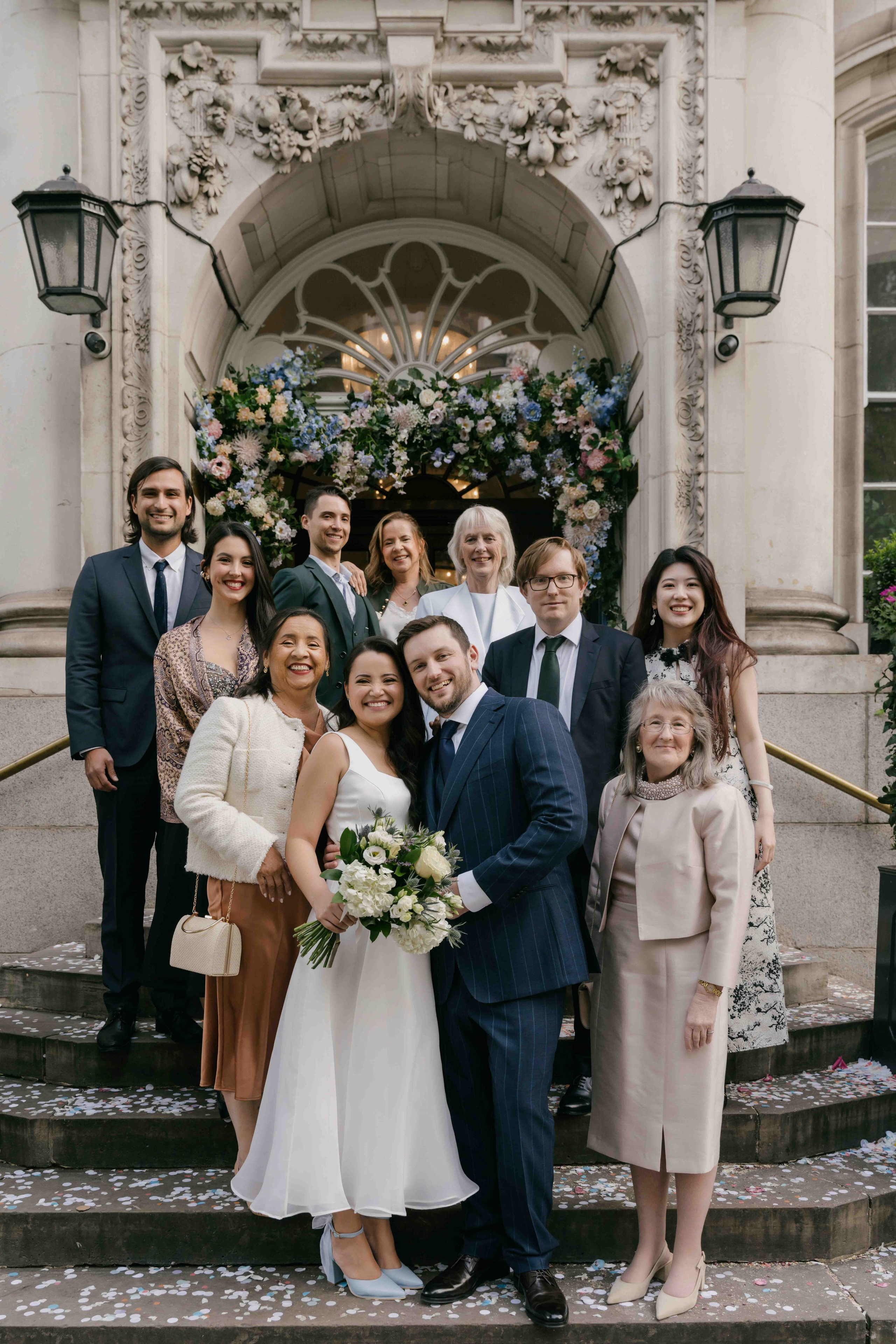 Chelsea Town Hall just married confetti shot, bride and groom surrounded by guests, intimate London civil wedding