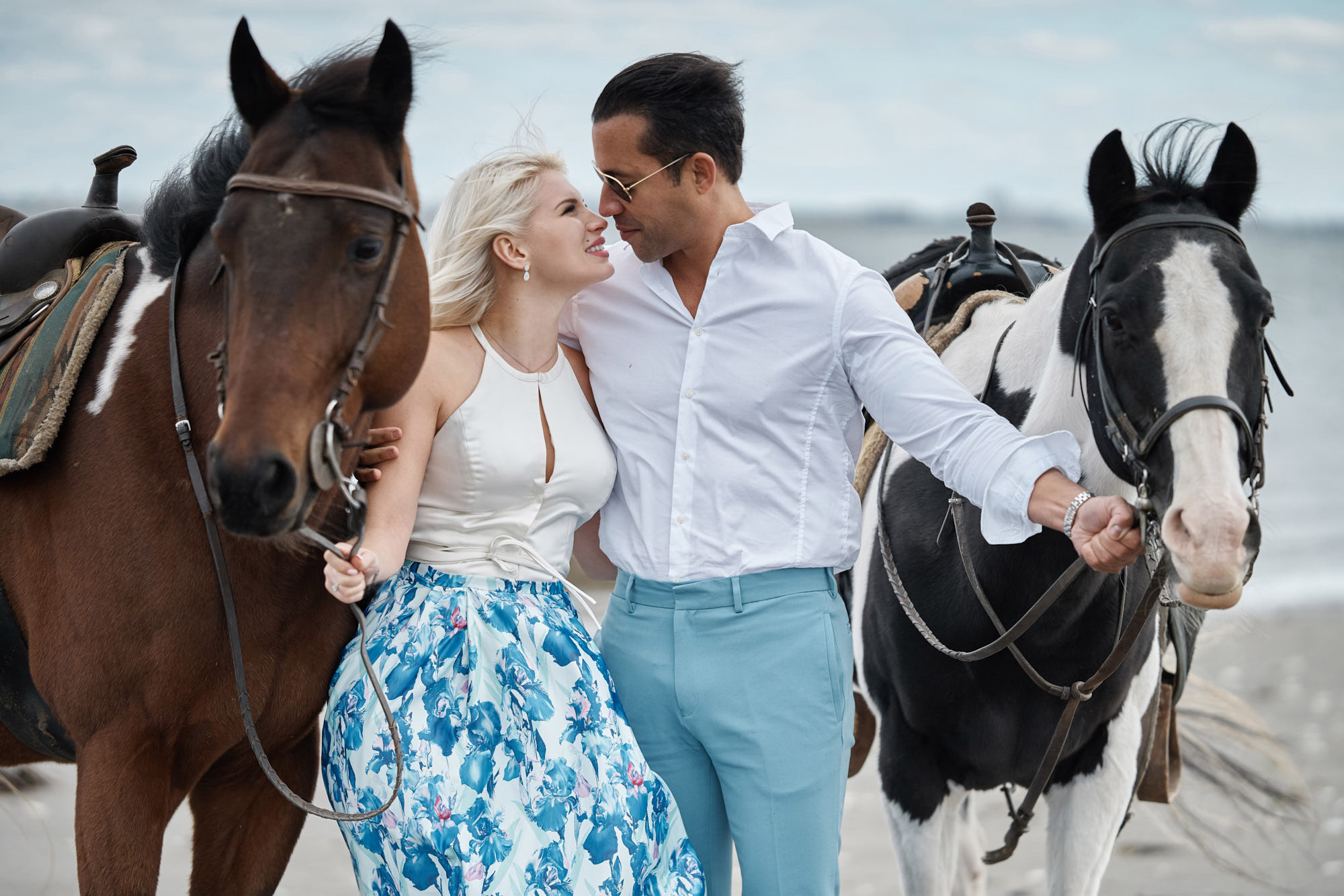 Editorial engagement photosession with horses on the beach, Jamaica Bay Riding Academy, Brooklyn, NY.