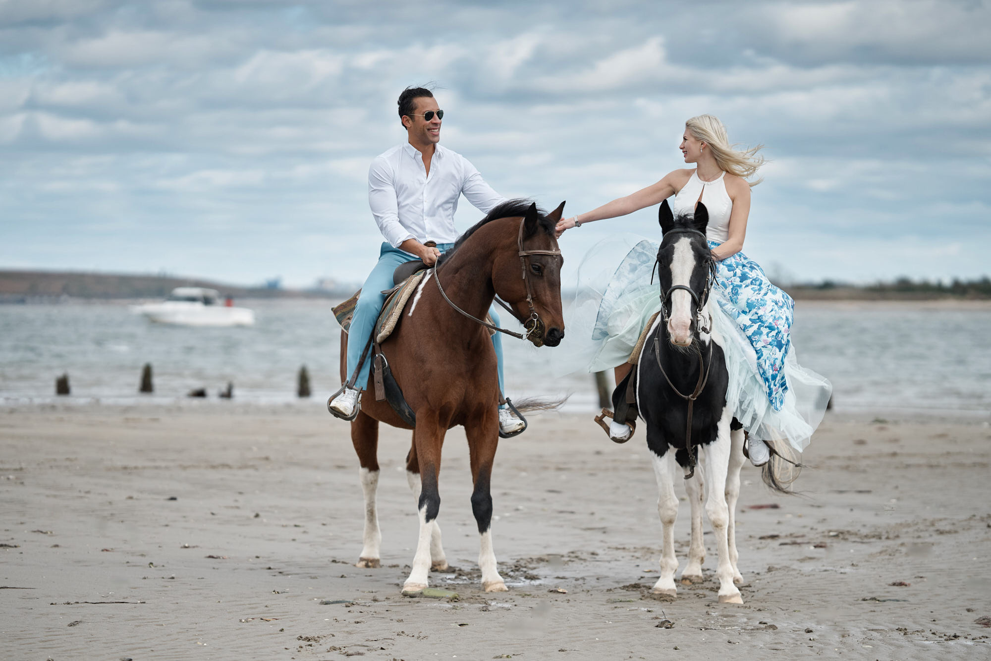 Creative beach engagement photos riding horses on the beach, Jamaica Bay Riding Academy, Brooklyn, NY.