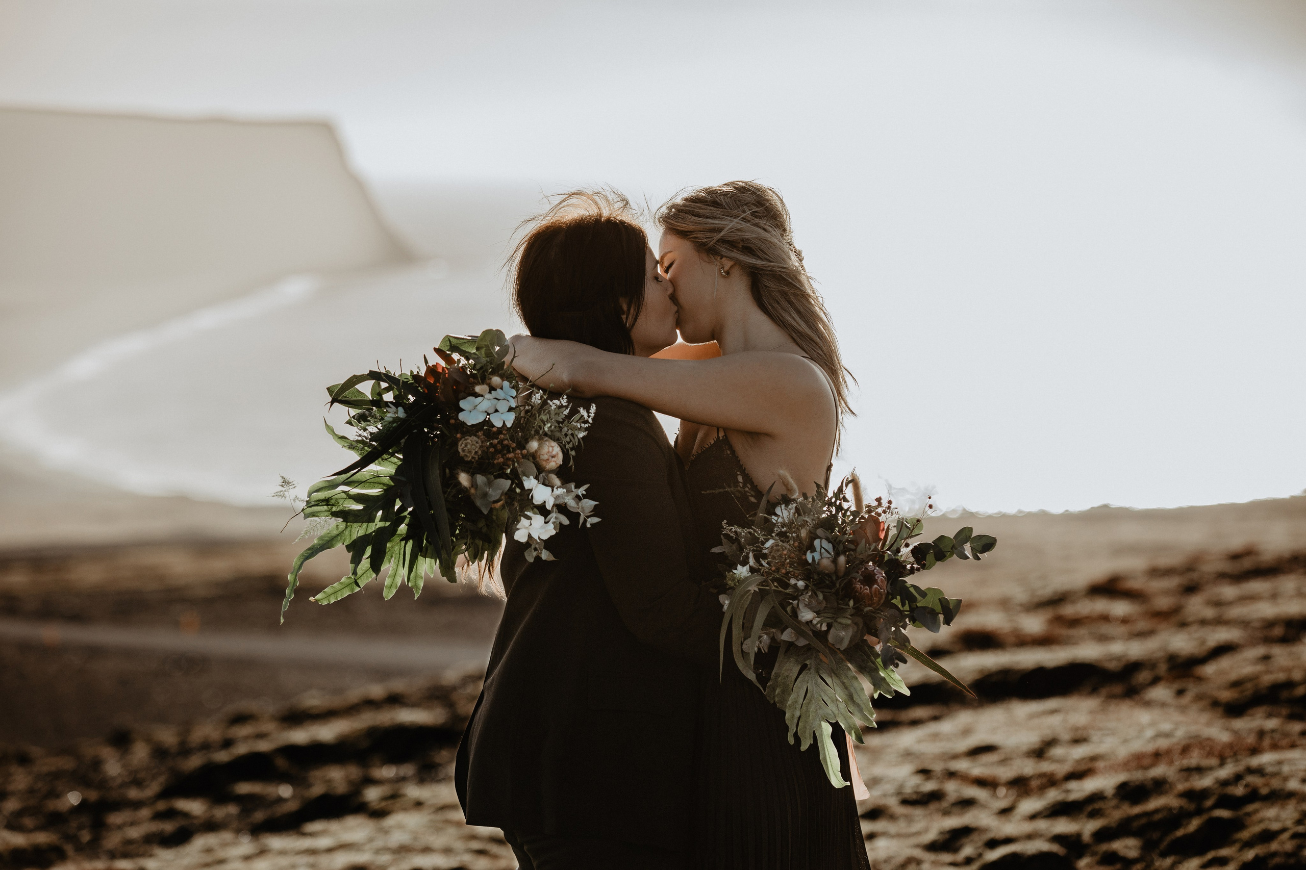 Same Sex Wedding at Iceland Black Sand Beach. Iceland elopement photographer & videographer