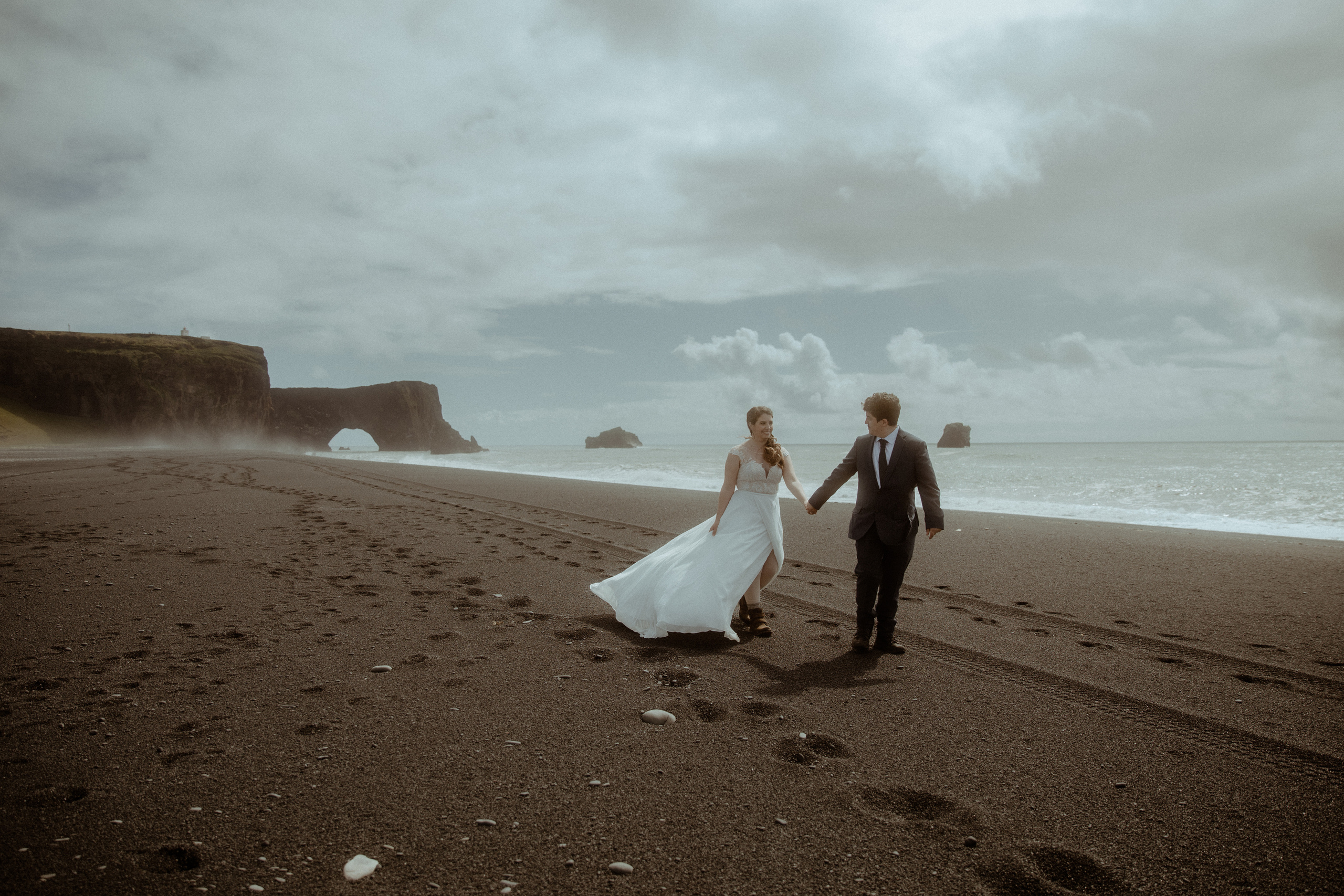 Elopement at Black sand beach in Iceland. Iceland elopement photographer & videographer