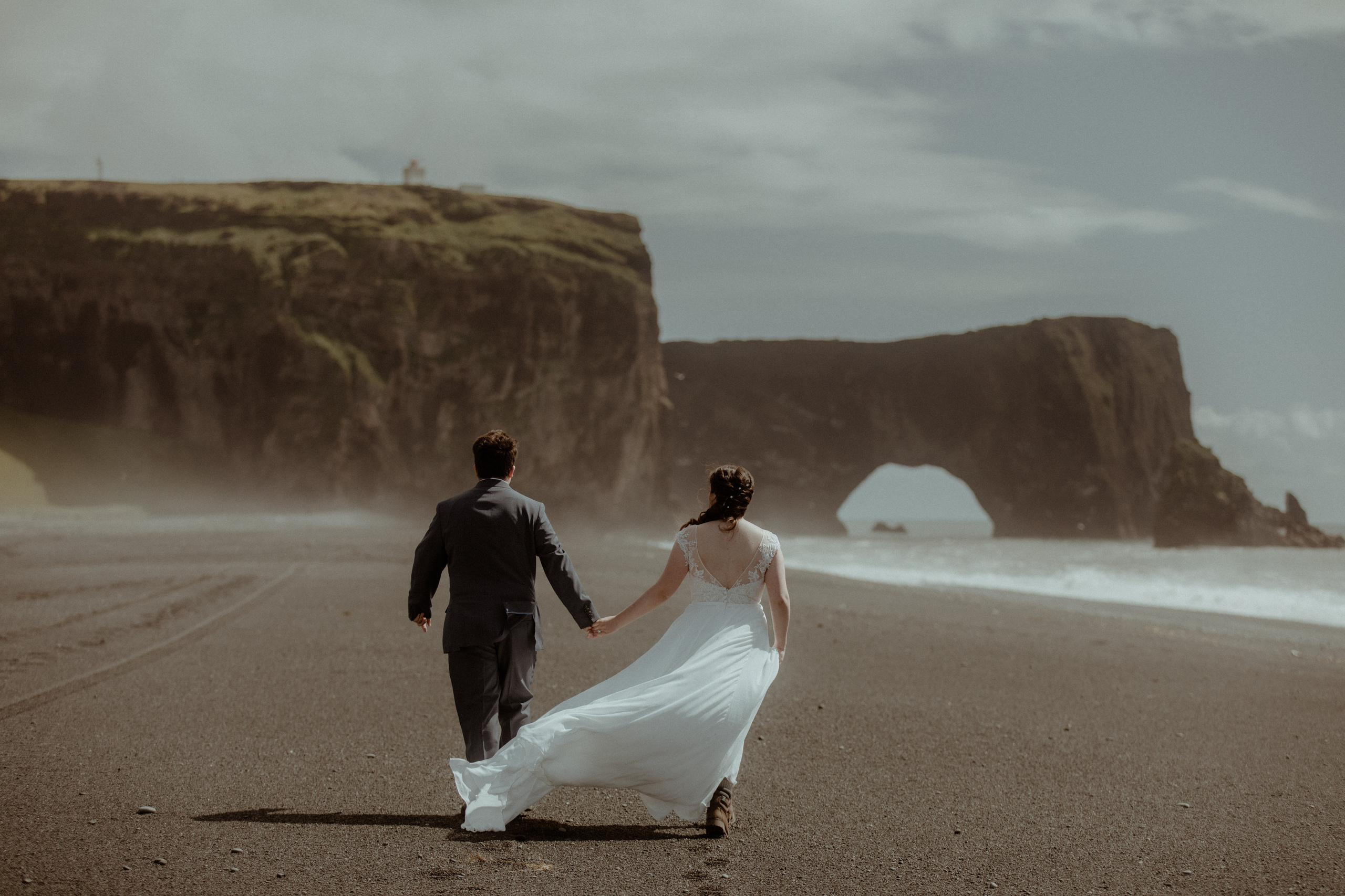Elopement at Black sand beach in Iceland. Iceland elopement photographer & videographer