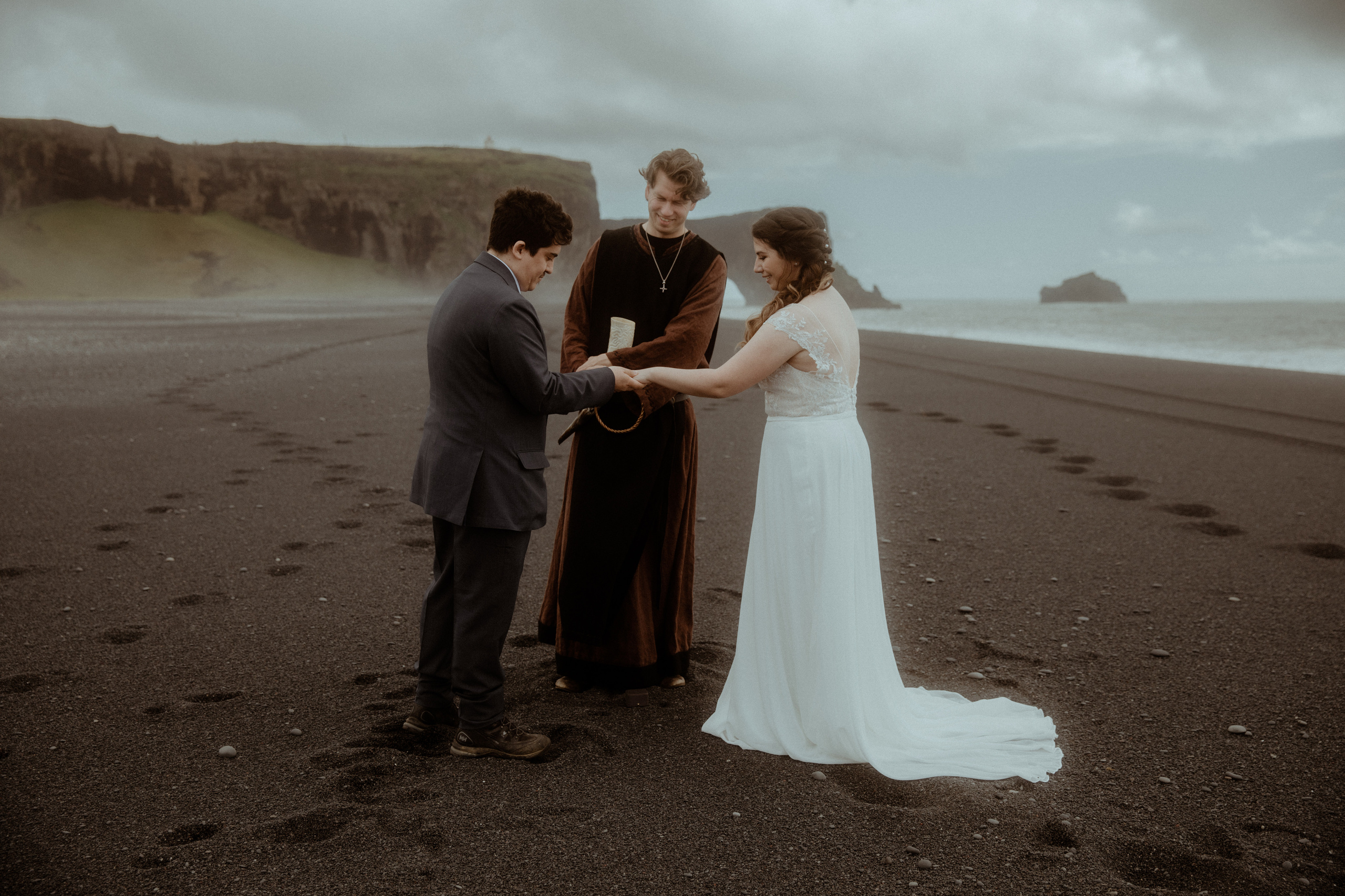 Elopement at Black sand beach in Iceland. Iceland elopement photographer & videographer