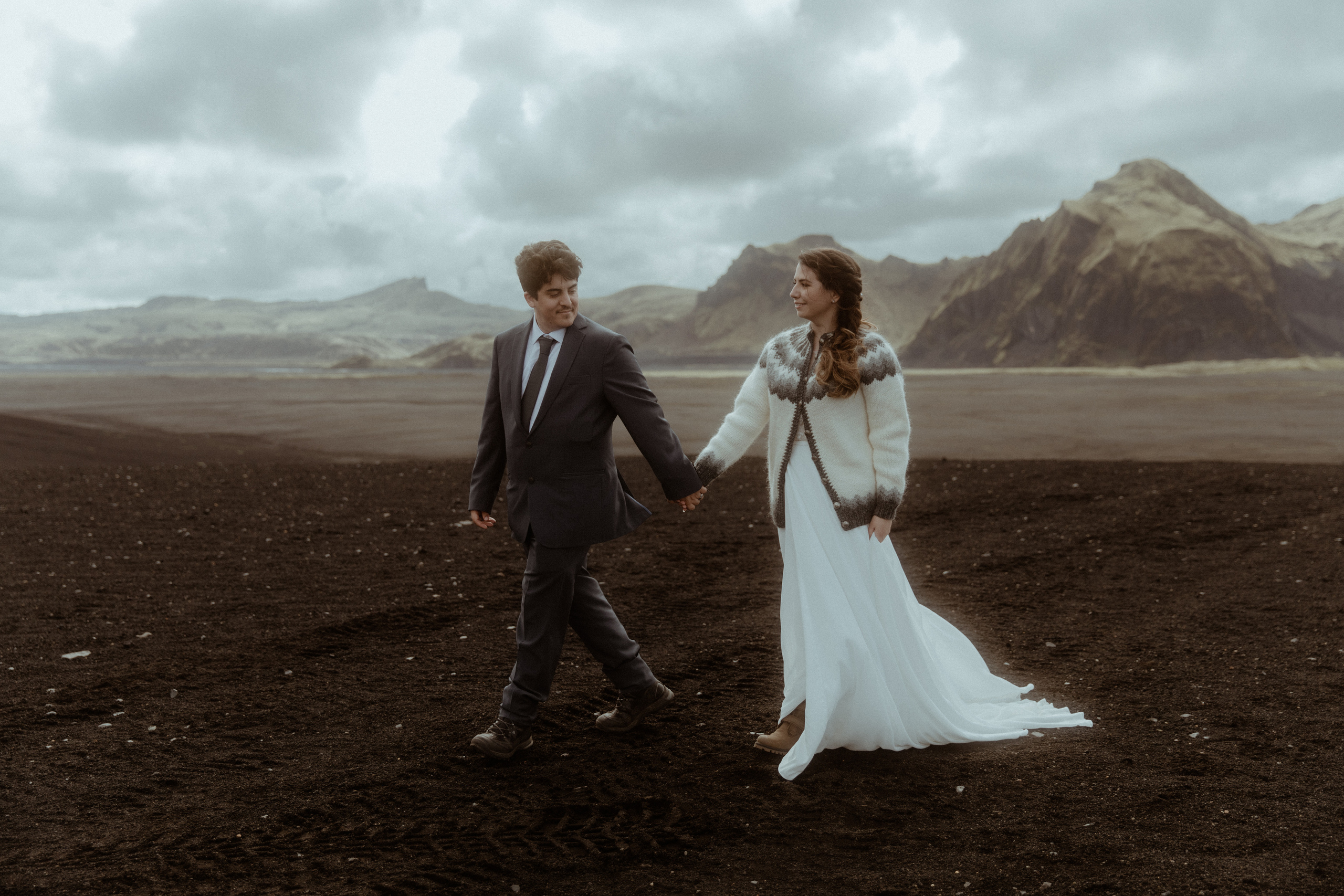 Elopement at Black sand beach in Iceland. Iceland elopement photographer & videographer