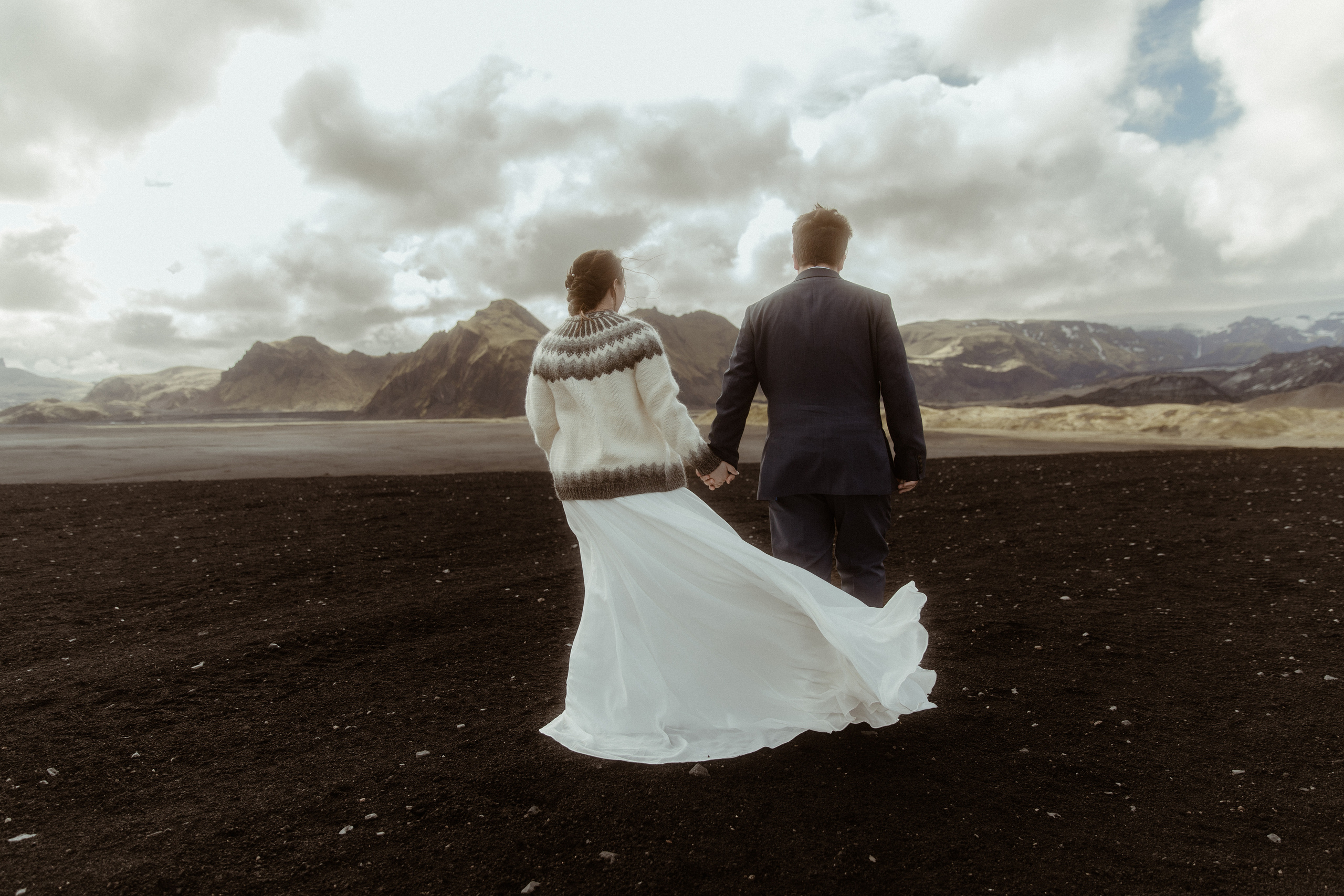 Elopement at Black sand beach in Iceland. Iceland elopement photographer & videographer