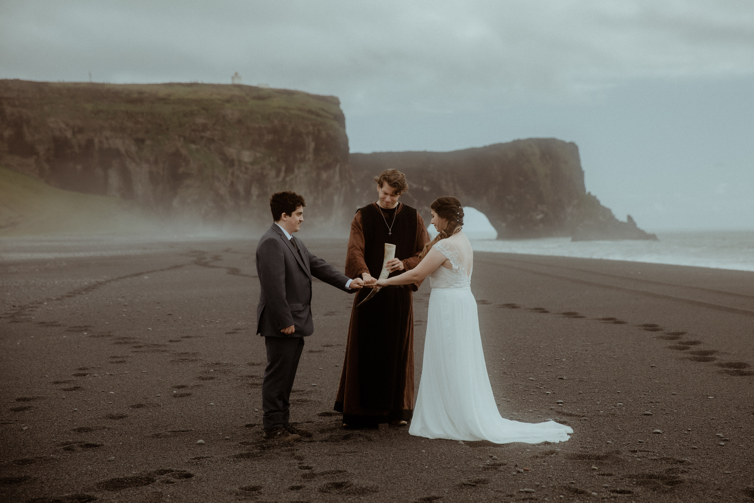 Elopement at Black sand beach in Iceland. Iceland elopement photographer & videographer