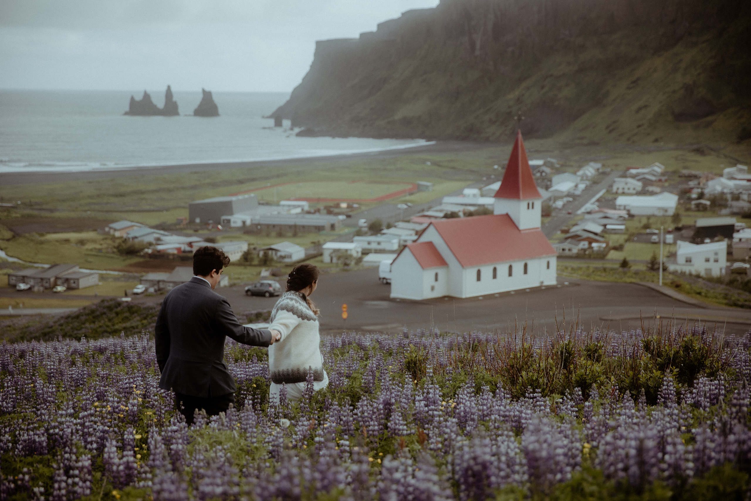 Elopement at Black sand beach in Iceland. Iceland elopement photographer & videographer