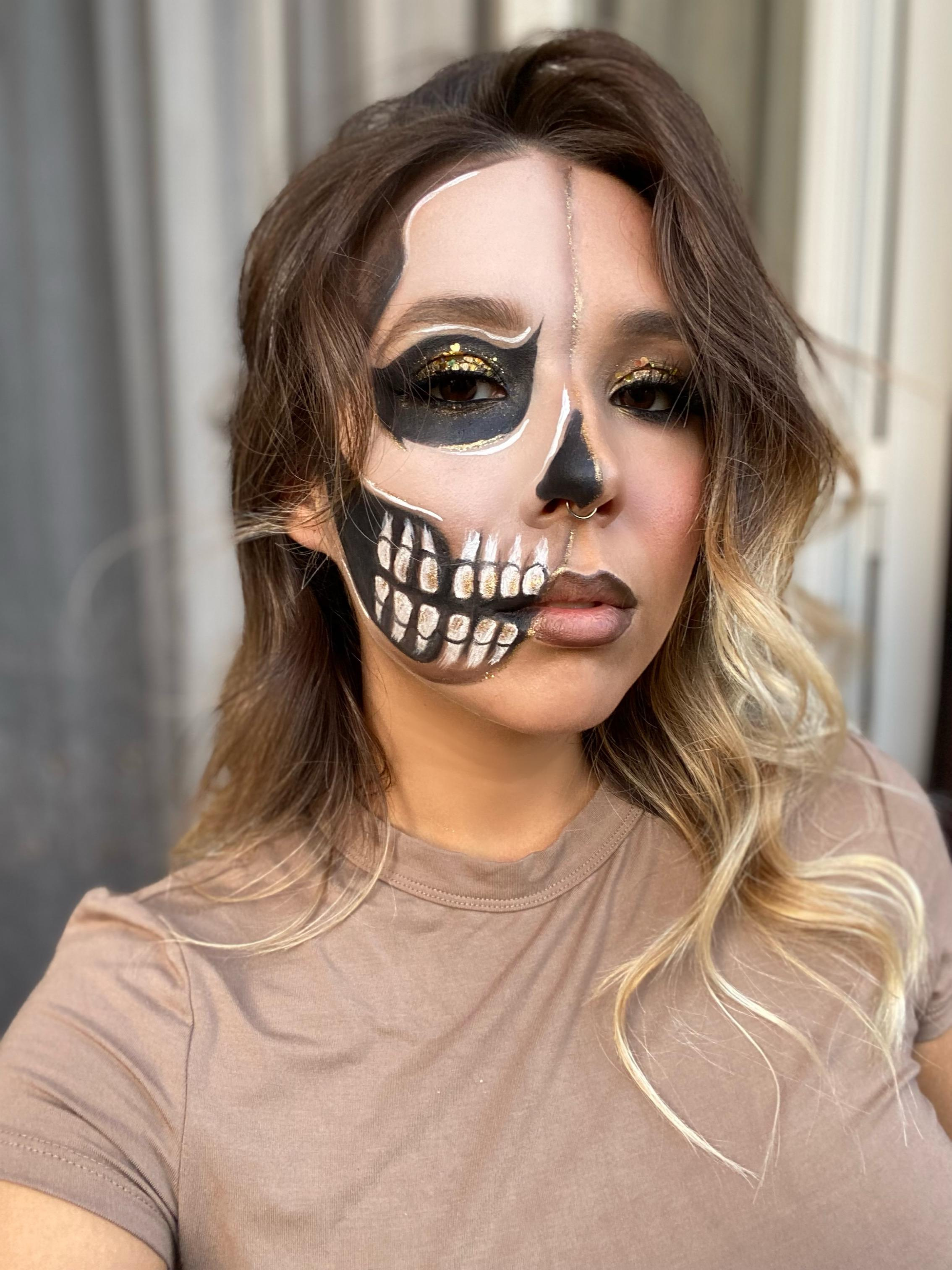 halloween skull half face makeup idea for a party in rome