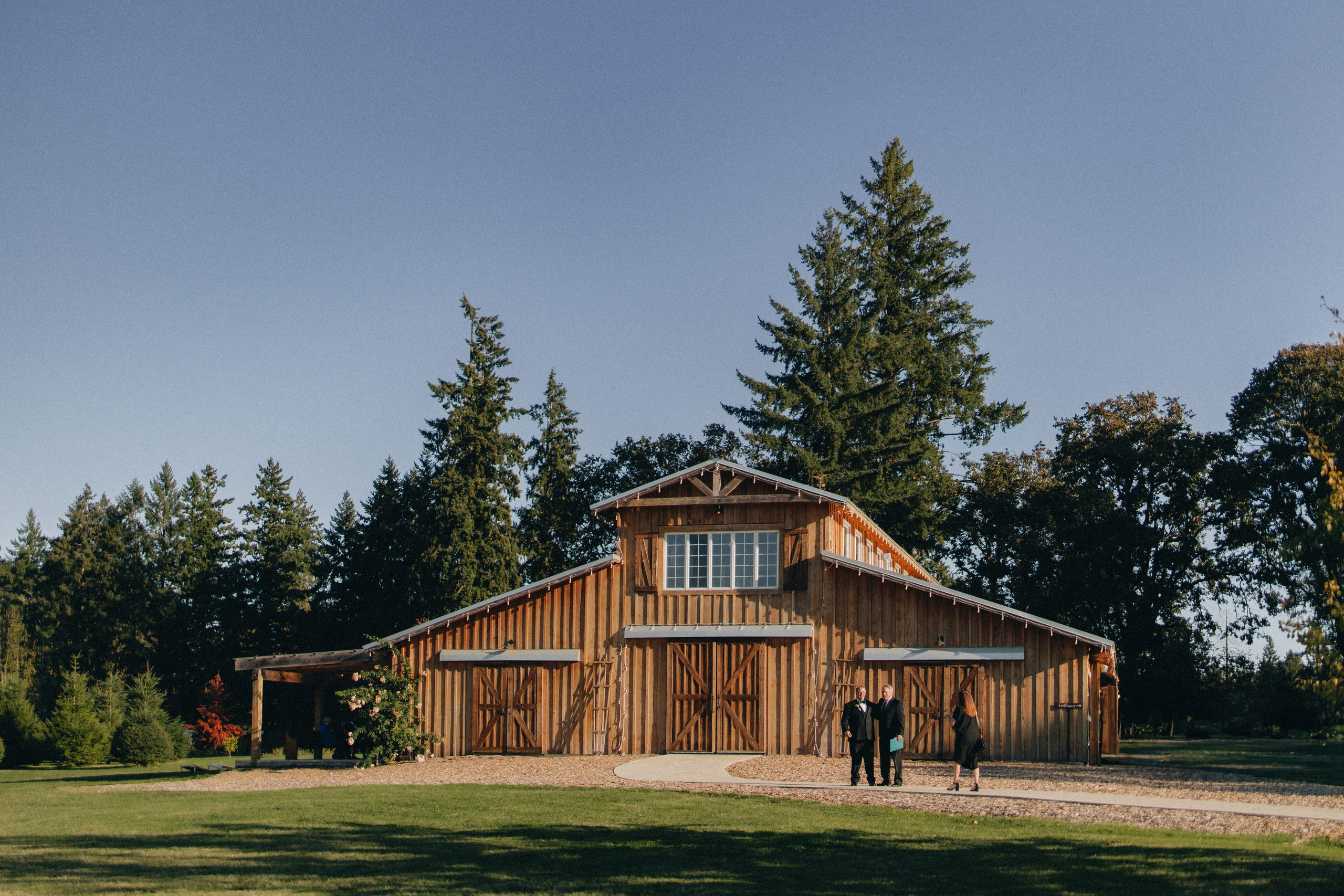 Jessie and Isaac on their wedding day in Portland, Oregon – a genuine moment of joy captured by photographer Georgy Shishkin in a romantic outdoor style, reflecting the charm of Portland & Seattle wedding photography.