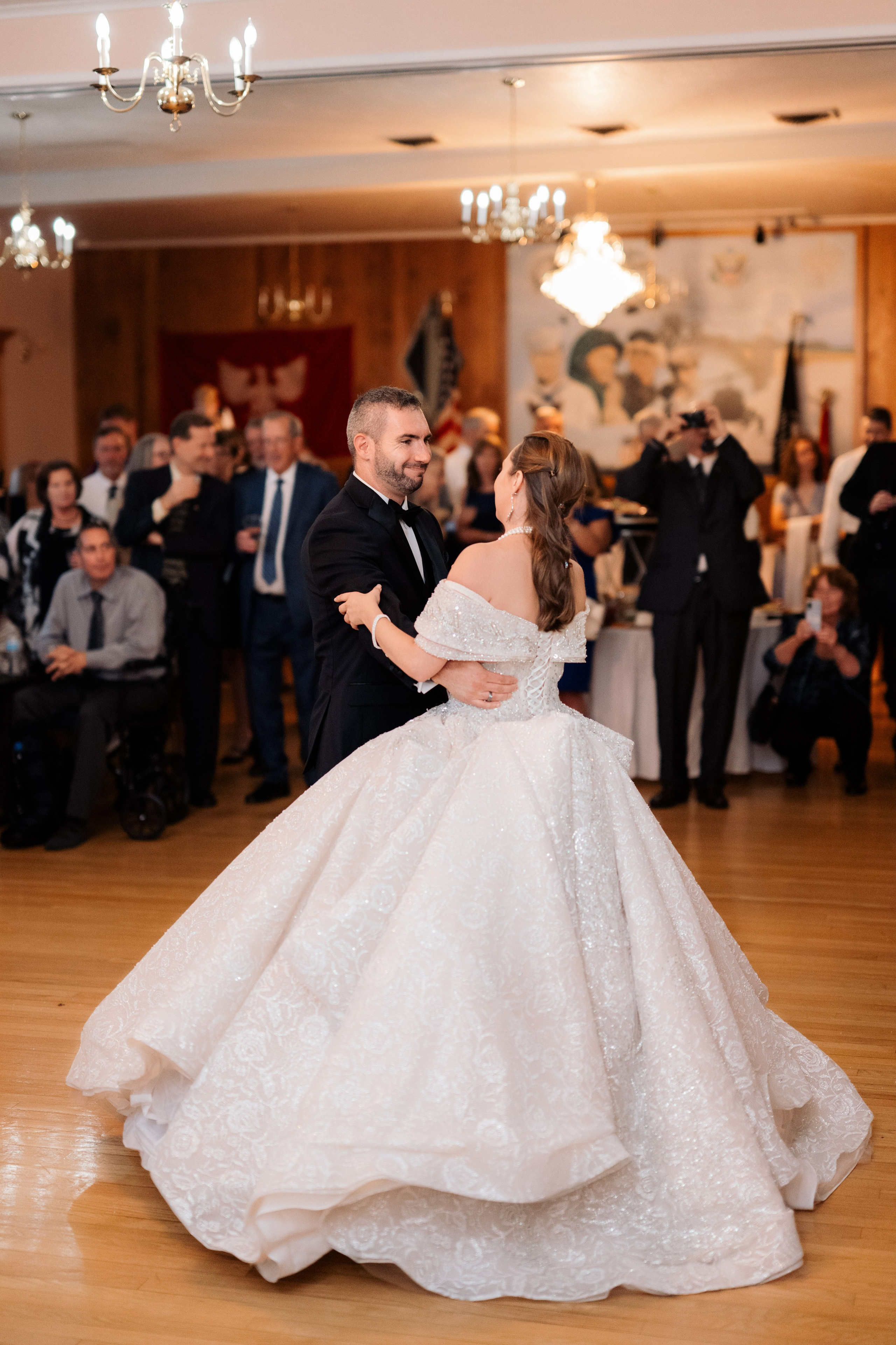 a bride and groom dancing at their wedding reception
