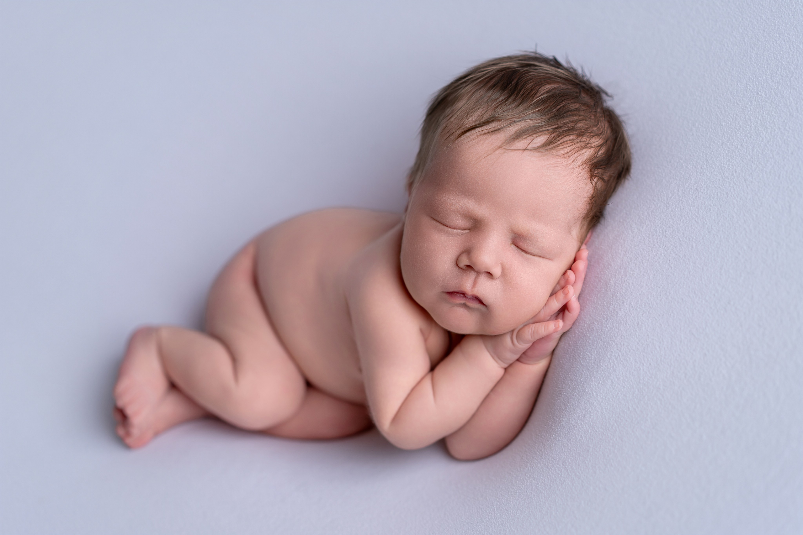 Neugeborenenfotos in Berlin – Studio oder bei Ihnen zu Hause