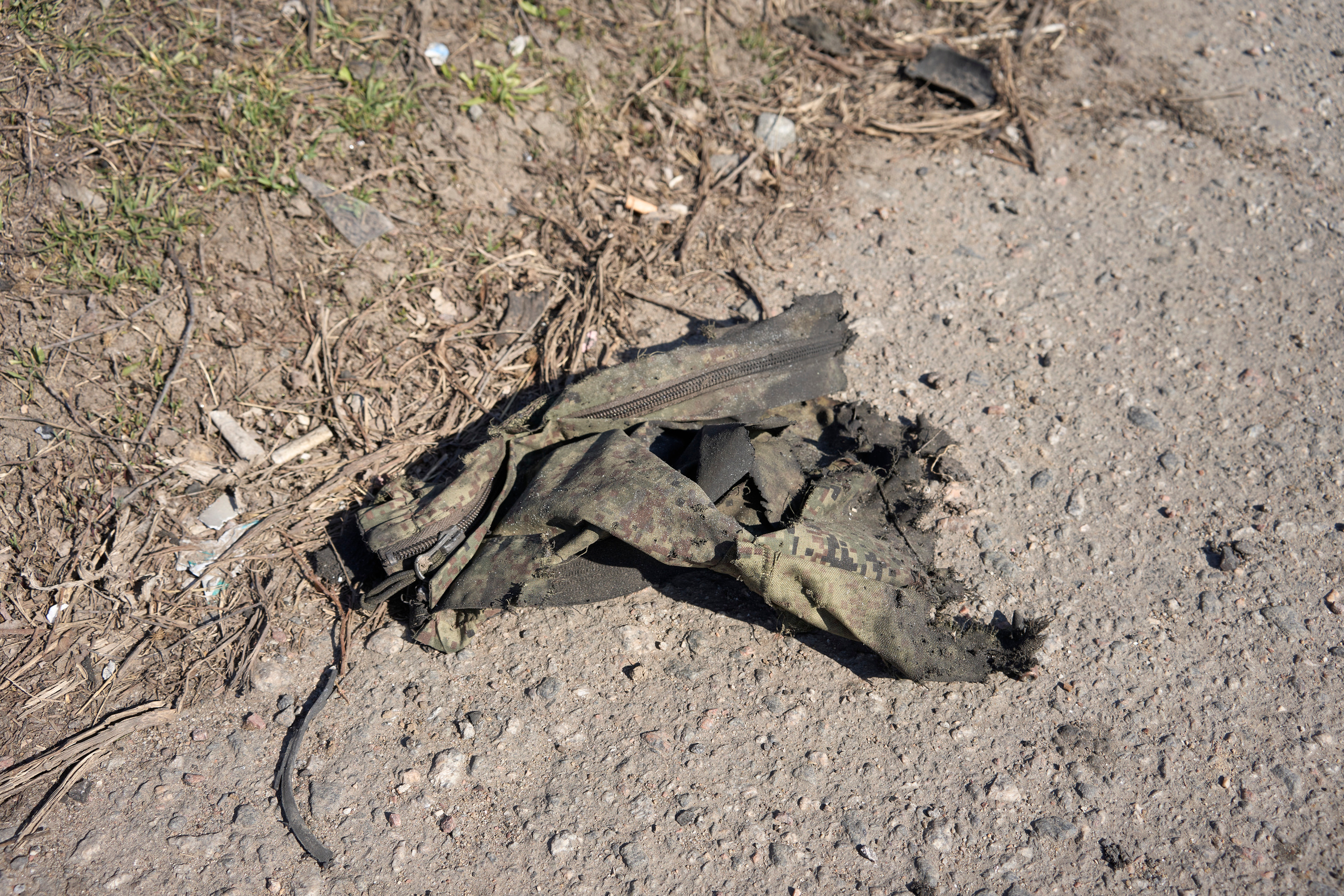 A piece of Russian soldier's uniform near the place of battle.
