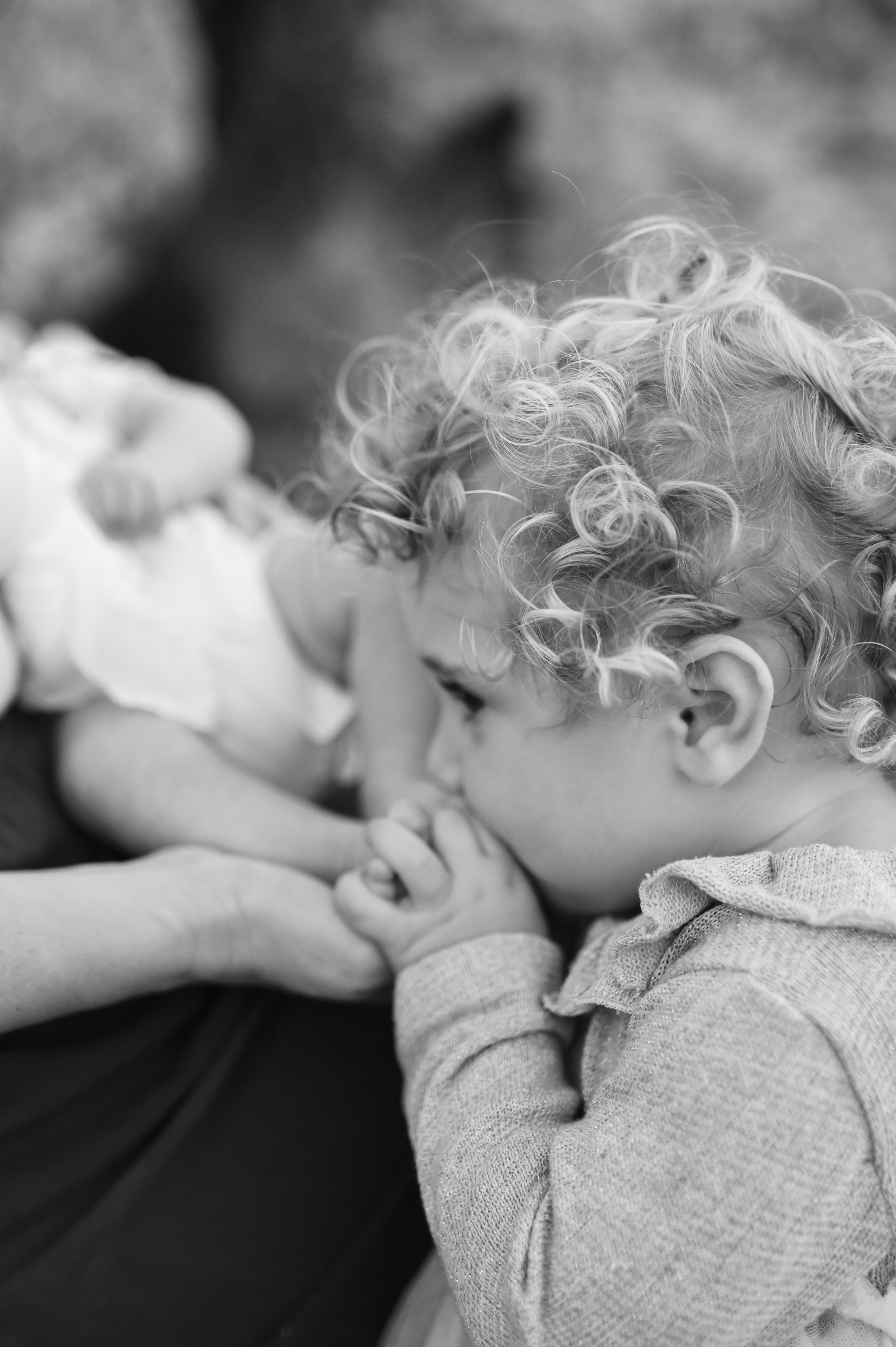 Happy family walking along a Rhodes beach at sunset. Photographer in Rhodes Island