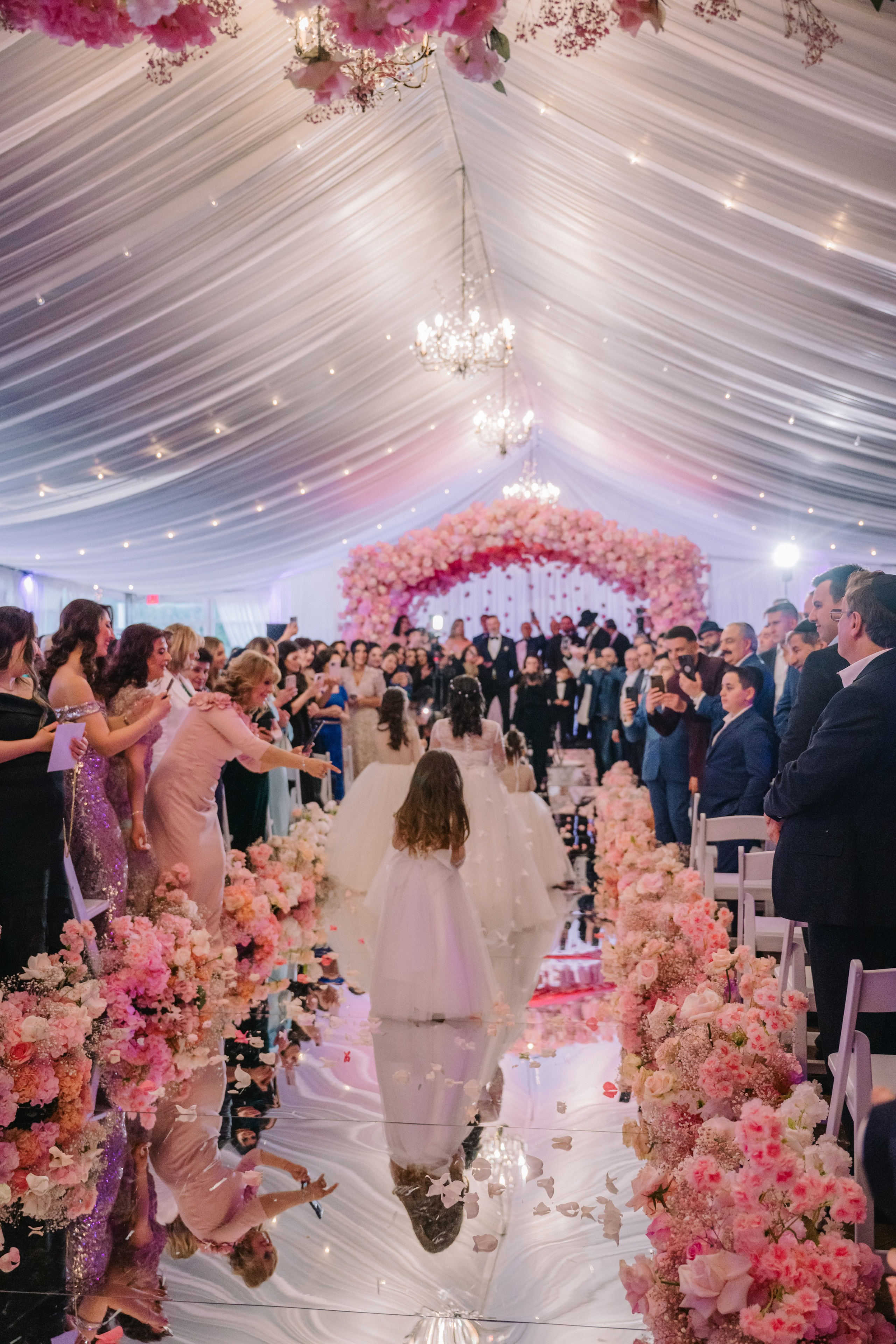 a bride walking down the aisle at her wedding