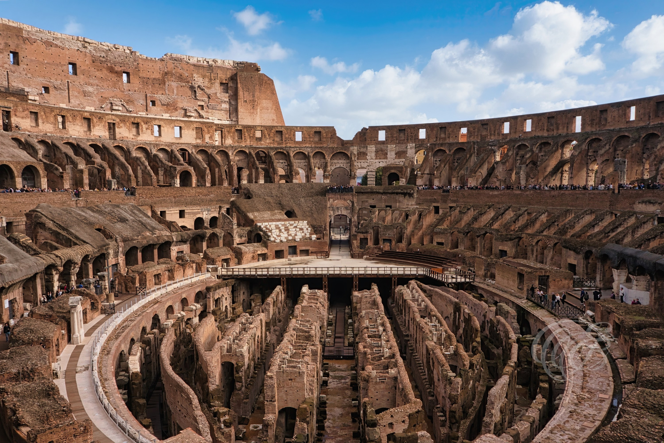 Rome, Italy – Inside the Colosseum at Sunset – Eduardo Bartoli Fine Art Photography – Sunset photograph of the Colosseum interior in Rome, golden light streaming through arches, Flavian amphitheater built 72–80 AD, ancient arena with stone walls illuminated – Rome, Italy – Inside the Colosseum at Sunset – Eduardo Bartoli Fine Art Photography.