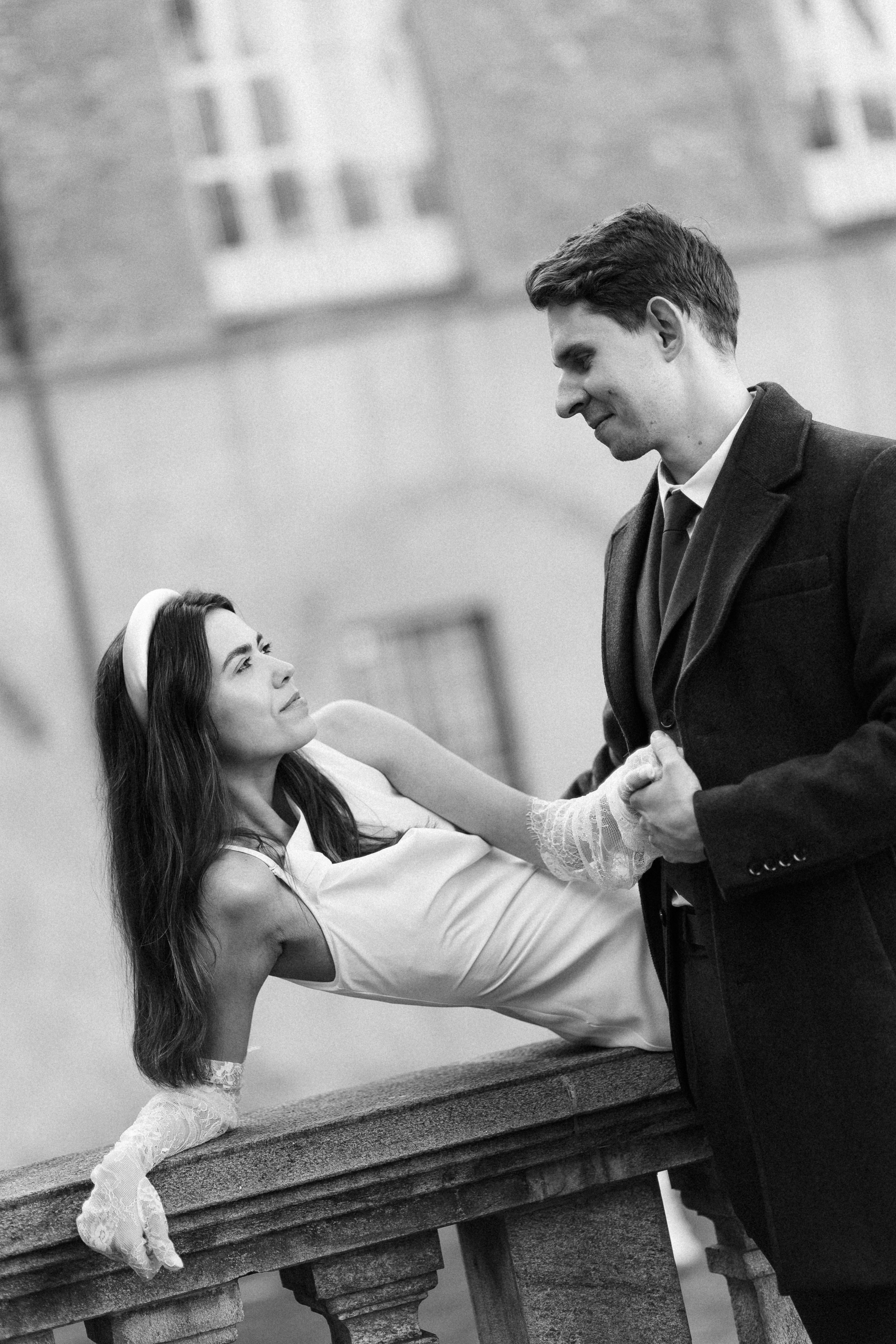 Wedding couple walking through historic streets of Turin