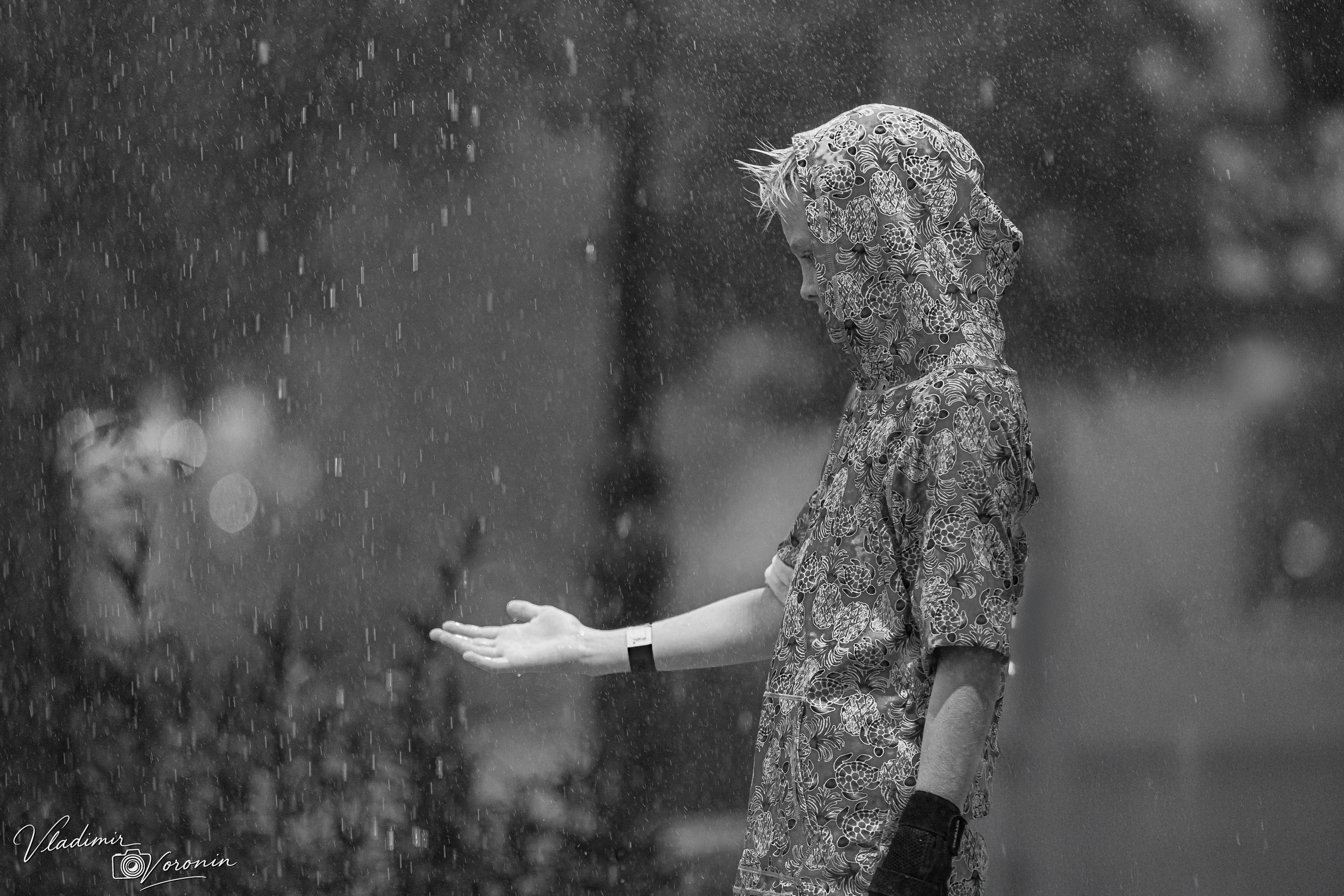 Rain in downtown. Photographer St. Augustine