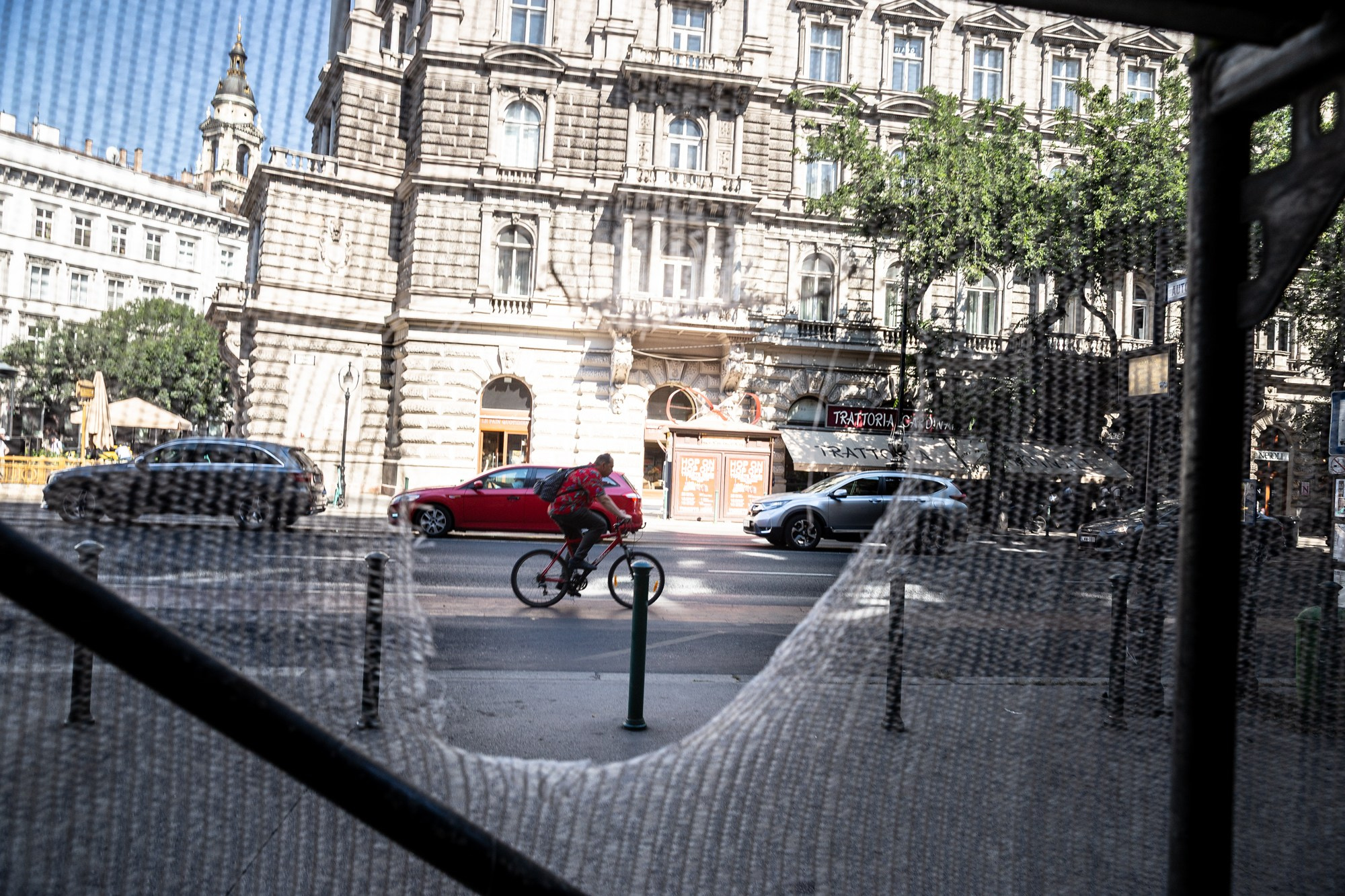 cyclist through the mesh | Budapest 2026 | CANON 6D