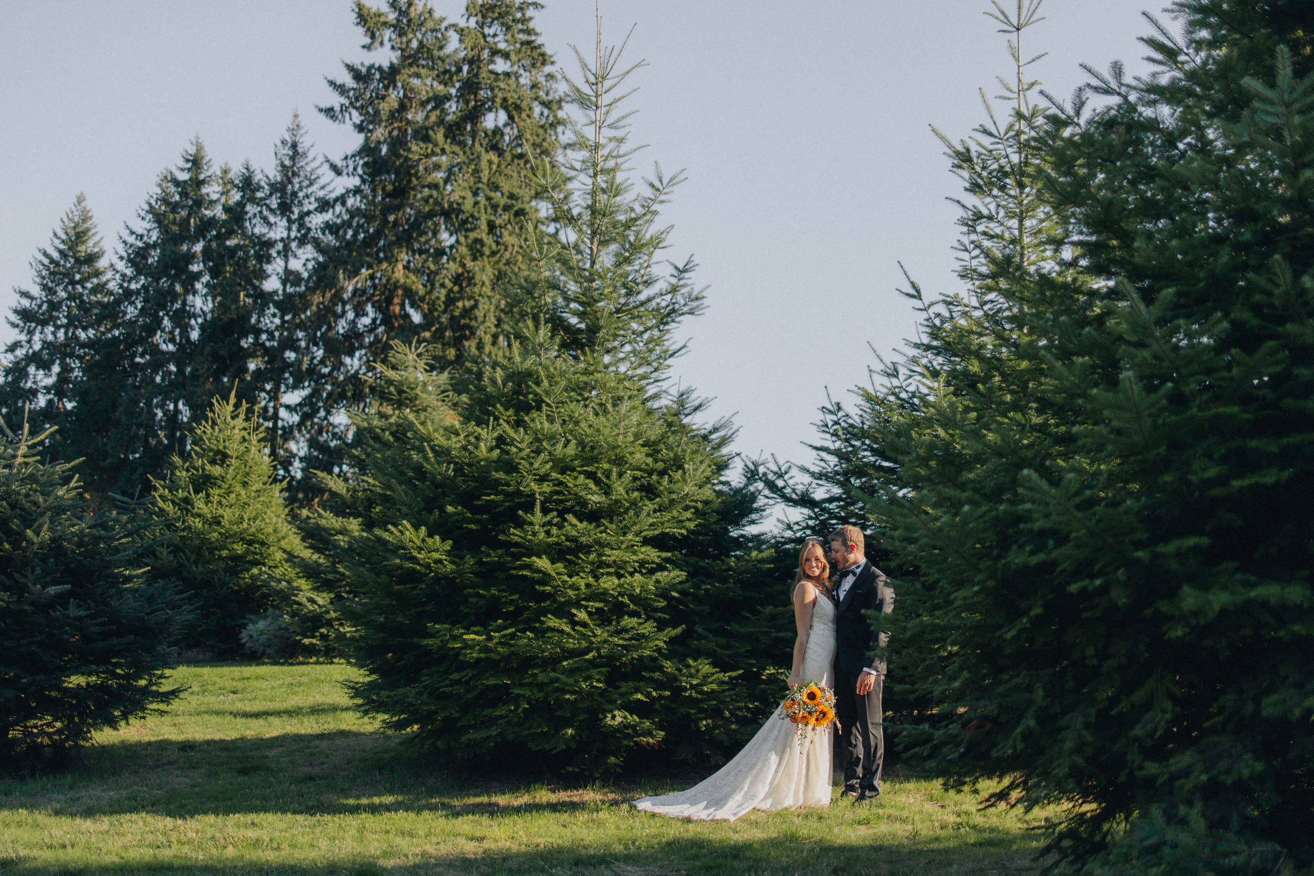 Jessie and Isaac on their wedding day in Portland, Oregon – a genuine moment of joy captured by photographer Georgy Shishkin in a romantic outdoor style, reflecting the charm of Portland & Seattle wedding photography.