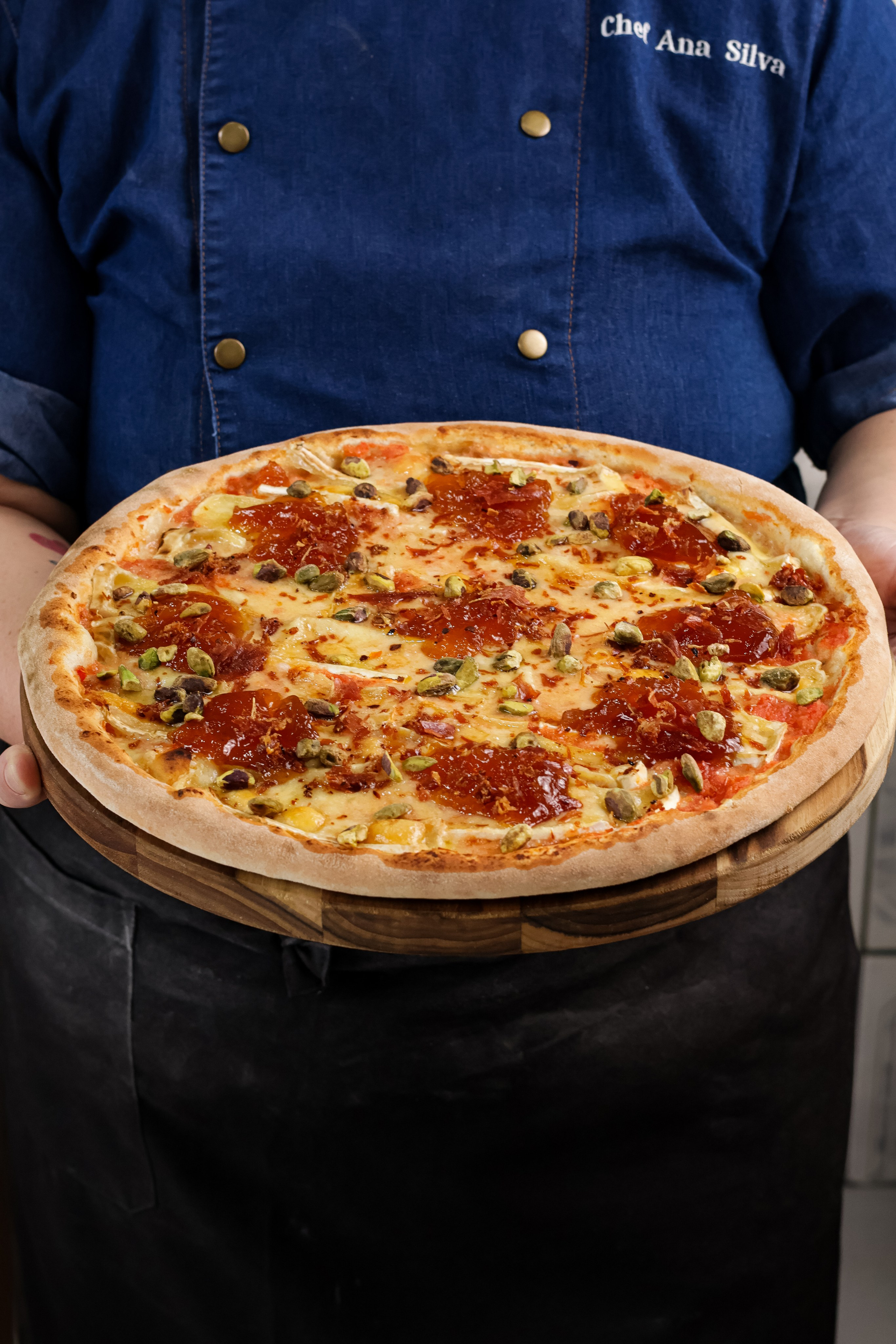 Fotografia profissional de pizza humanizada