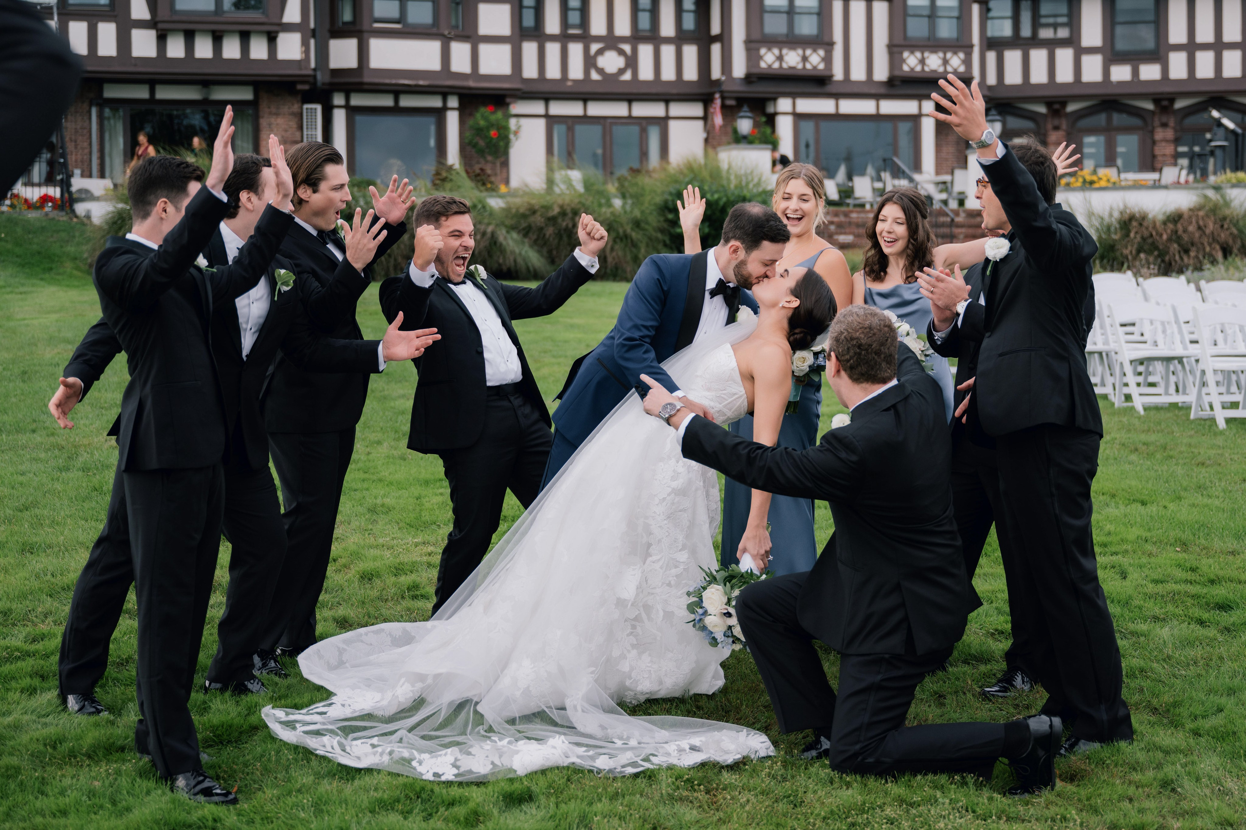 a bride and groom are surrounded by their friends