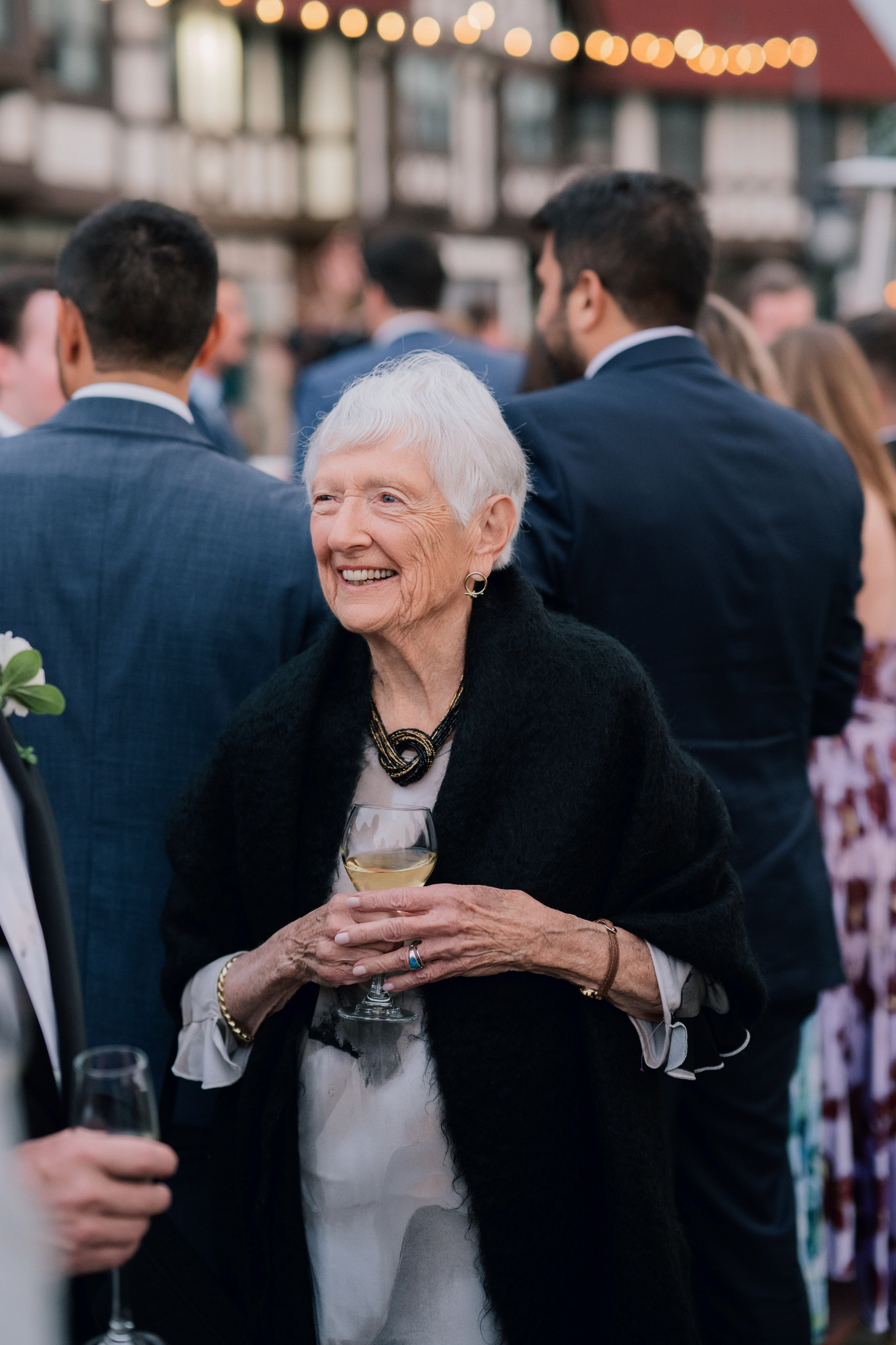a woman in a black coat