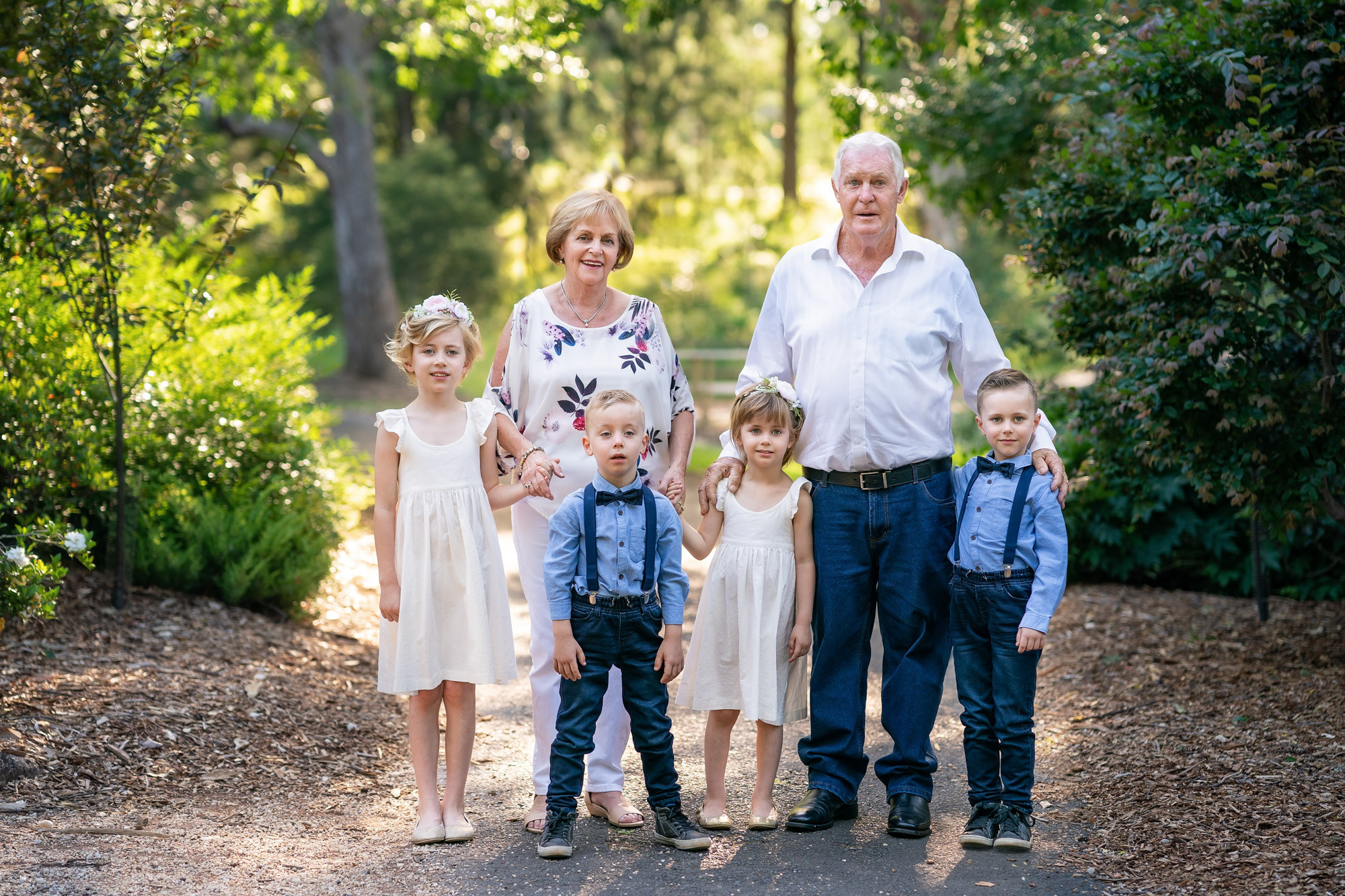 Extended family photoshoot in Sydney, grandparents, kids, mum and dad and grandchildren portraits in a beautiful park