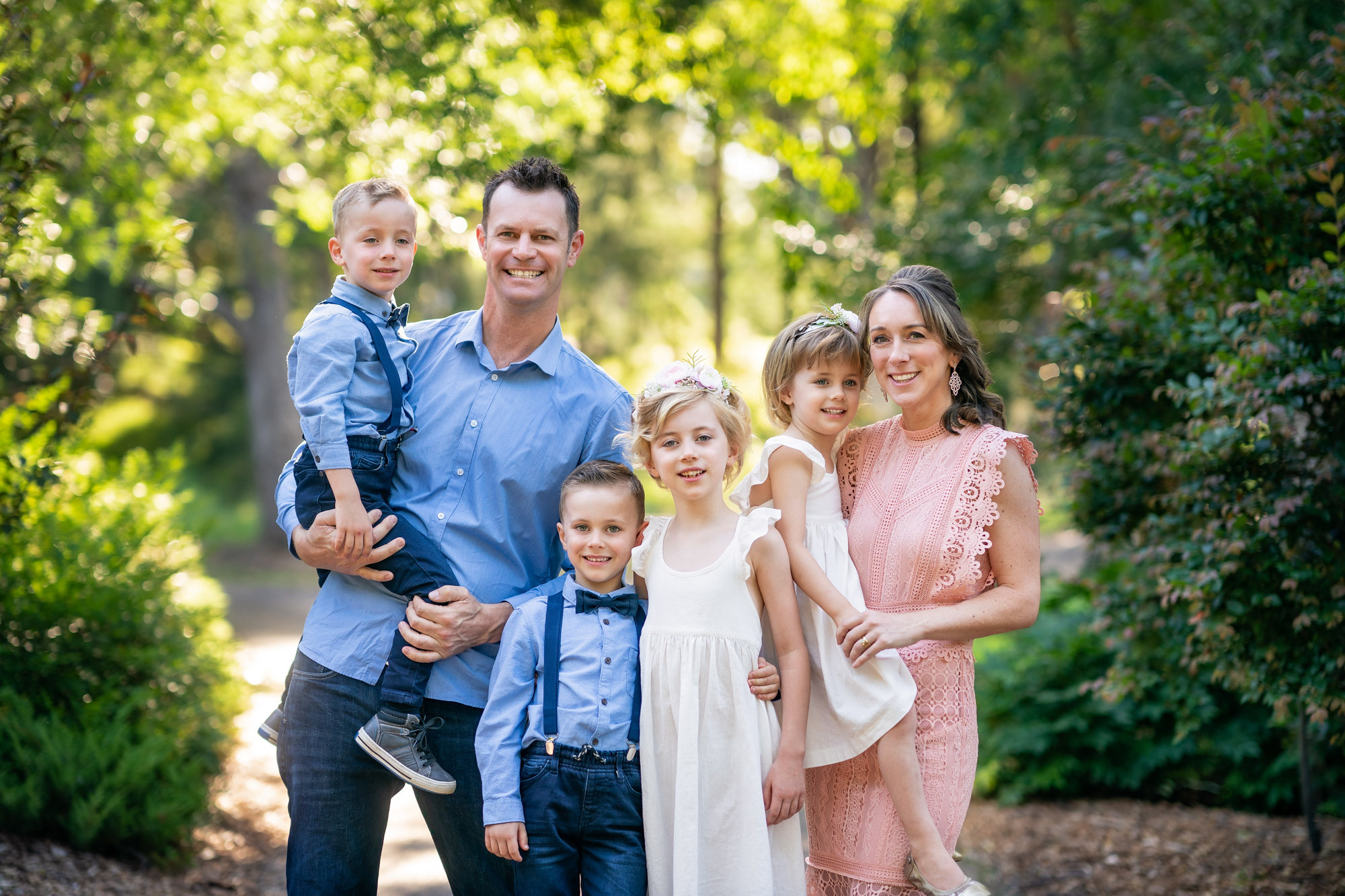 Extended family photoshoot in Sydney, grandparents, kids, mum and dad and grandchildren portraits in a beautiful park