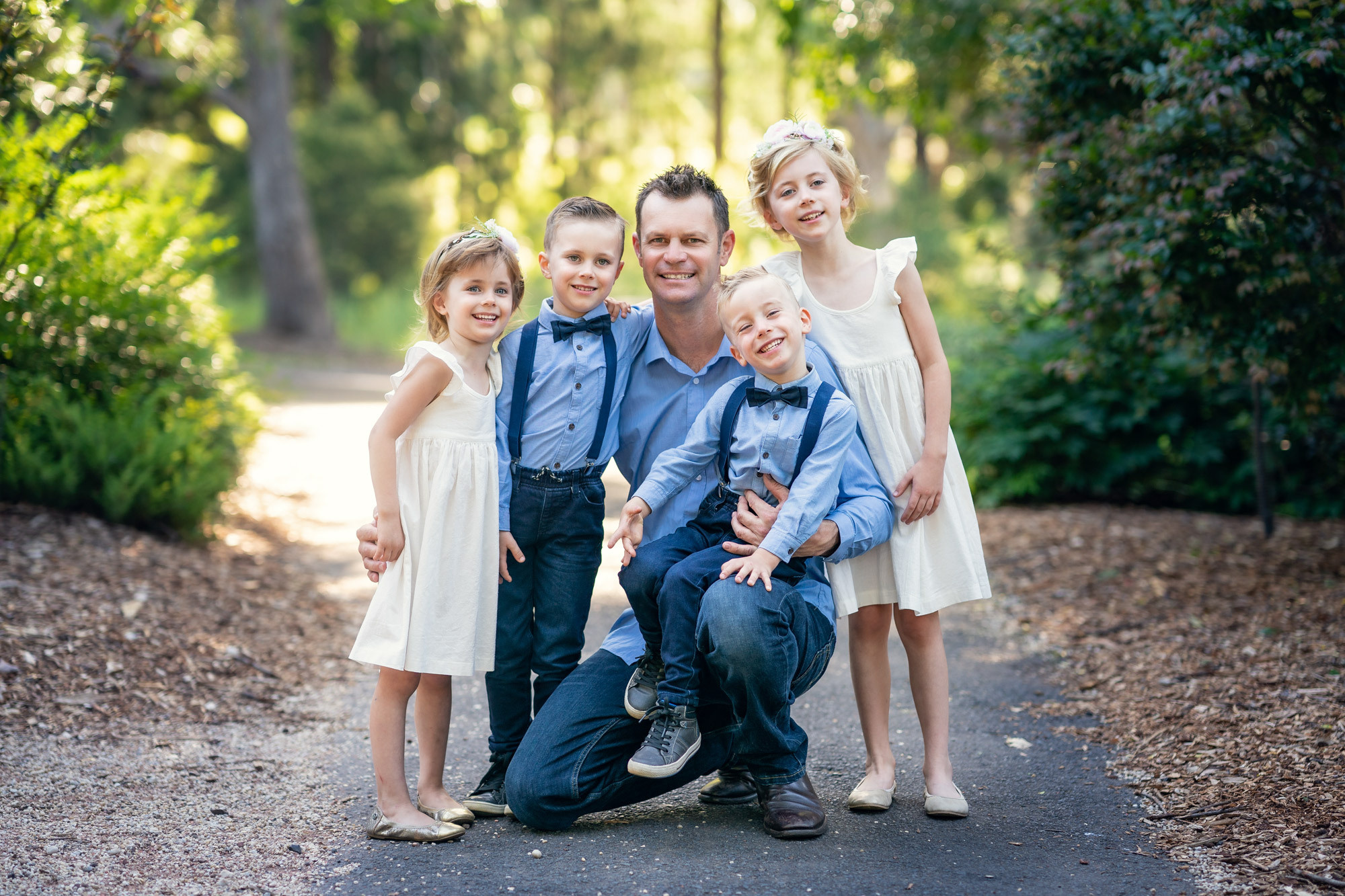 Extended family photoshoot in Sydney, grandparents, kids, mum and dad and grandchildren portraits in a beautiful park