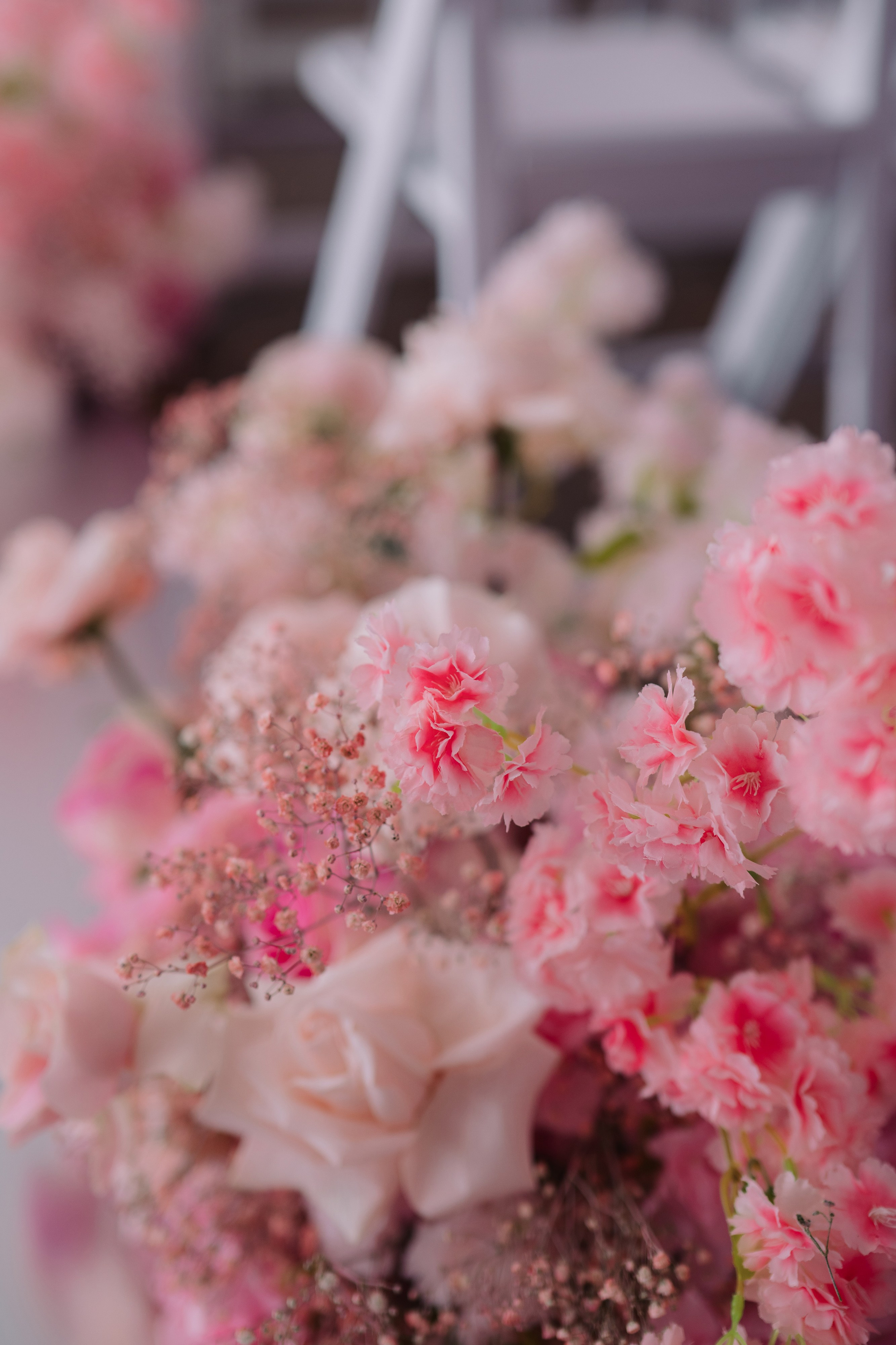pink flowers in a vase on a table