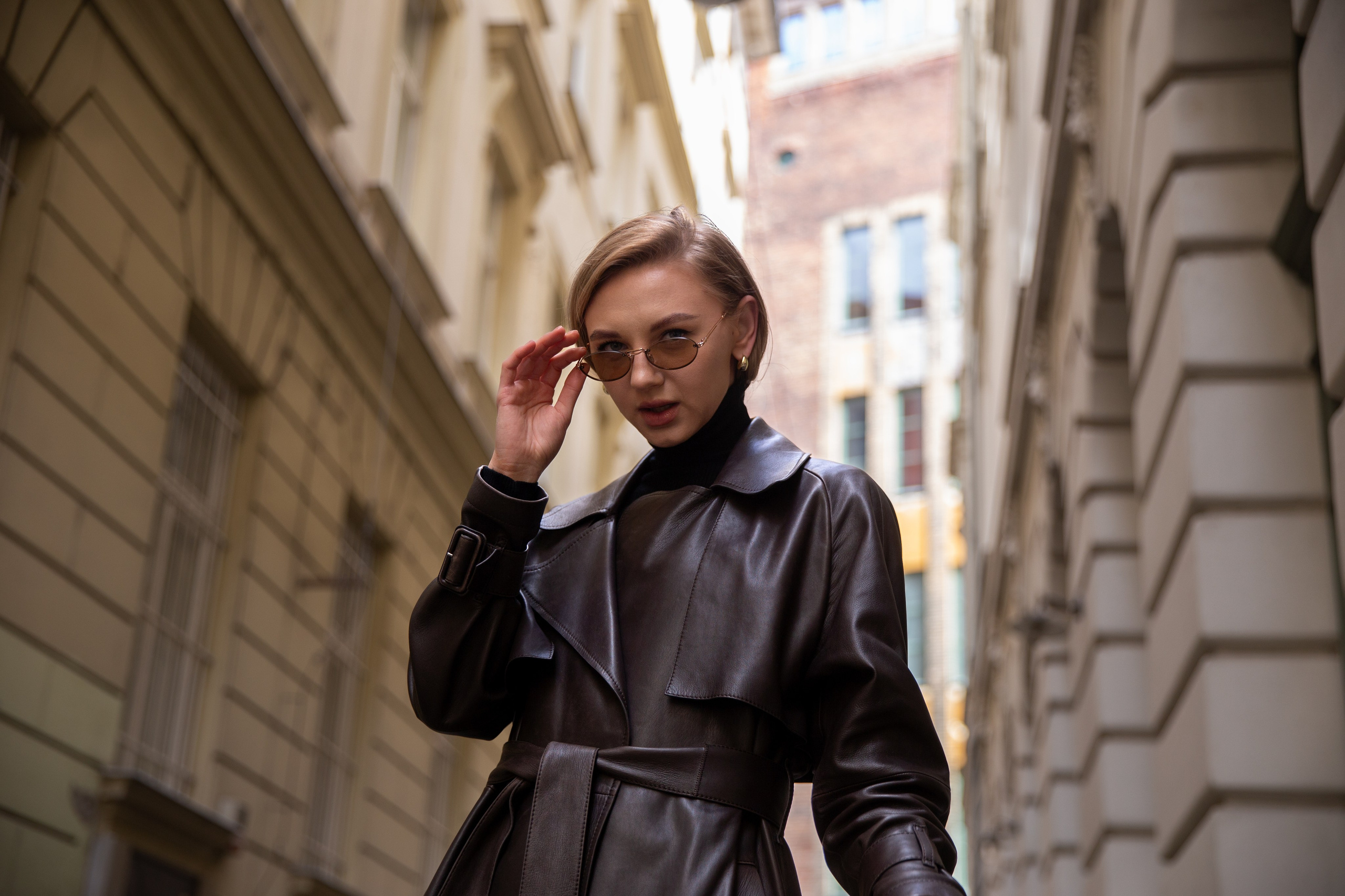 Woman in jacket with glasses