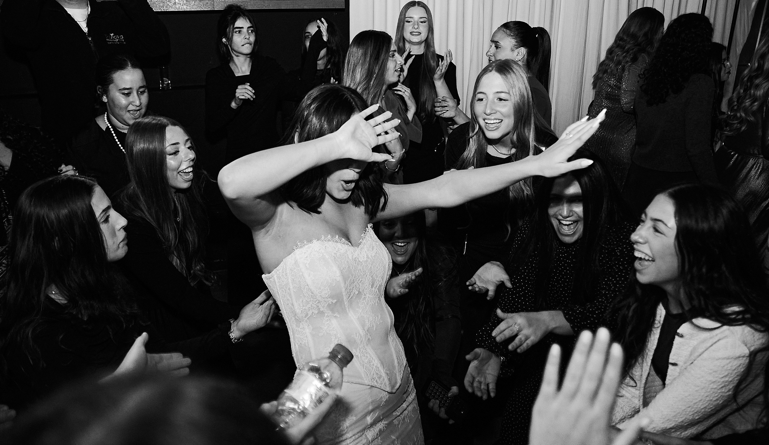 Bride joyful dancing at wedding party