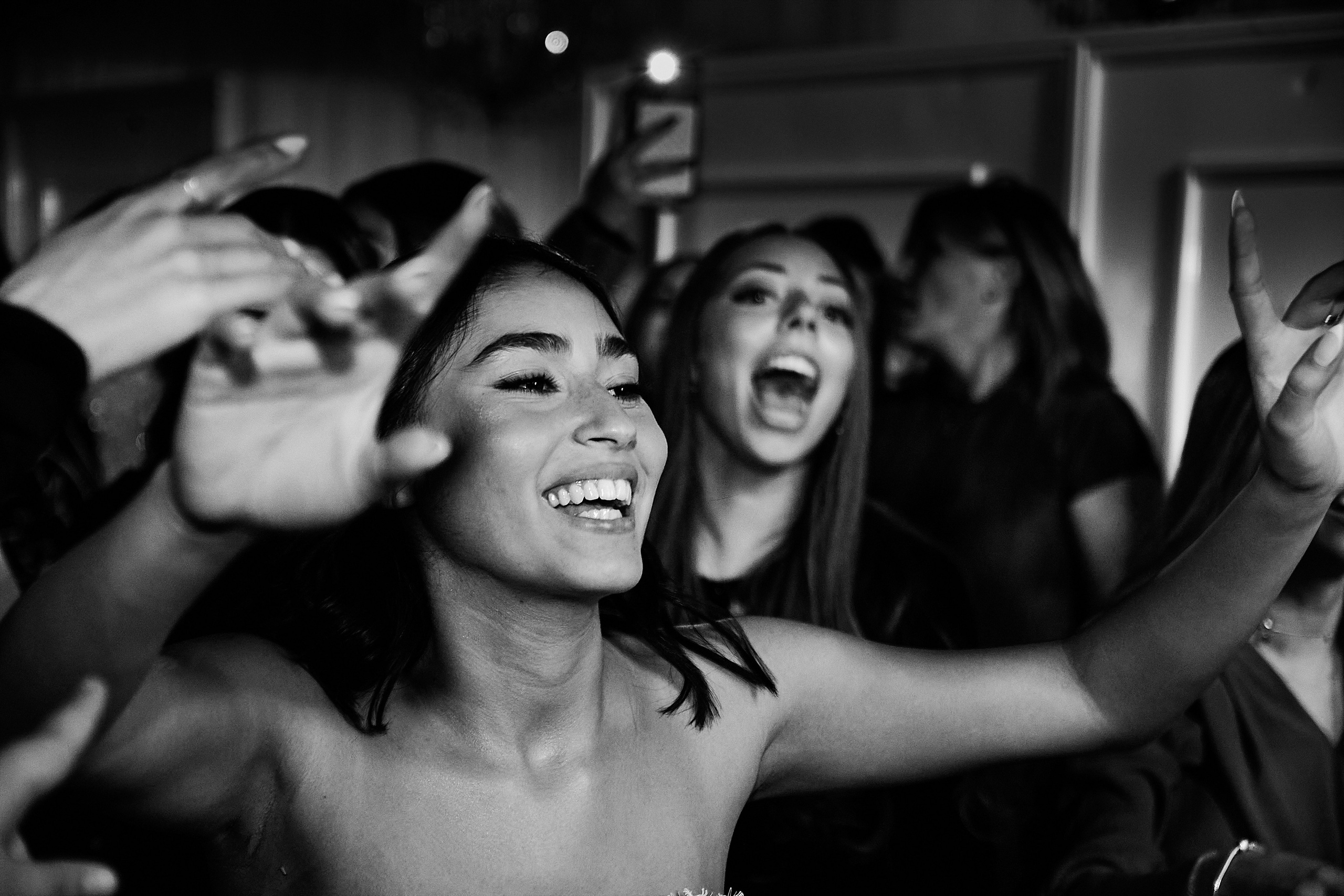 Bride joyful dancing at wedding party