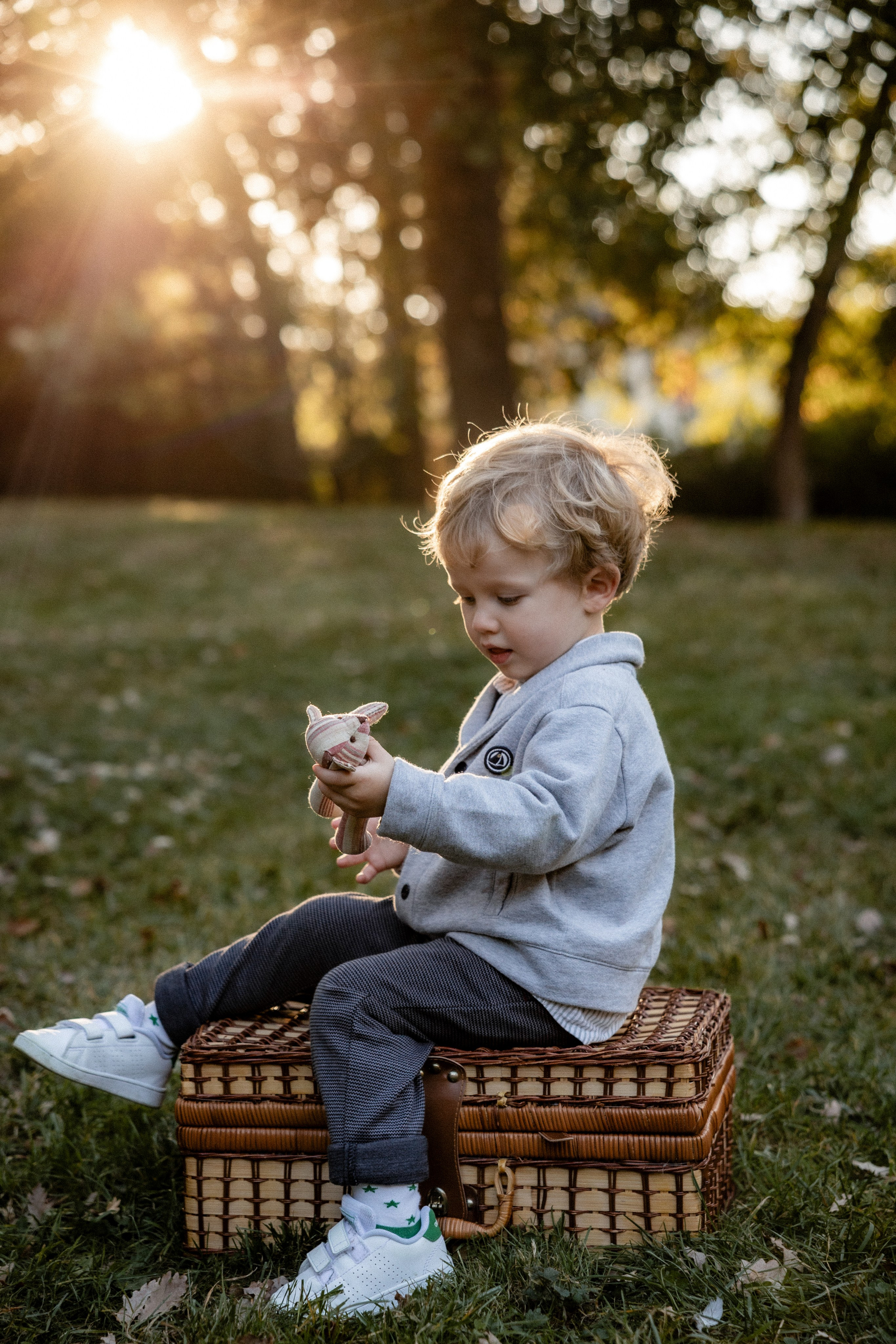 Natural light photo of a kid in park of Toulouse