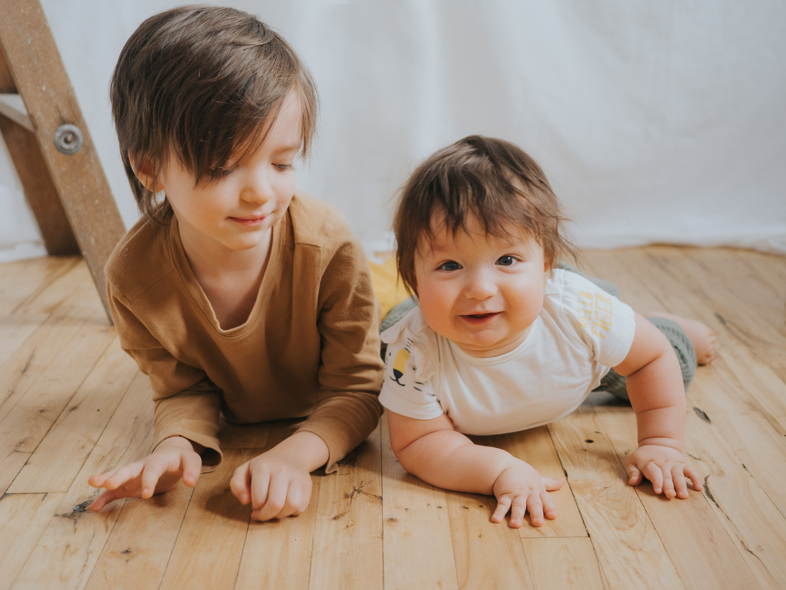 Brothers doing tummy time together.