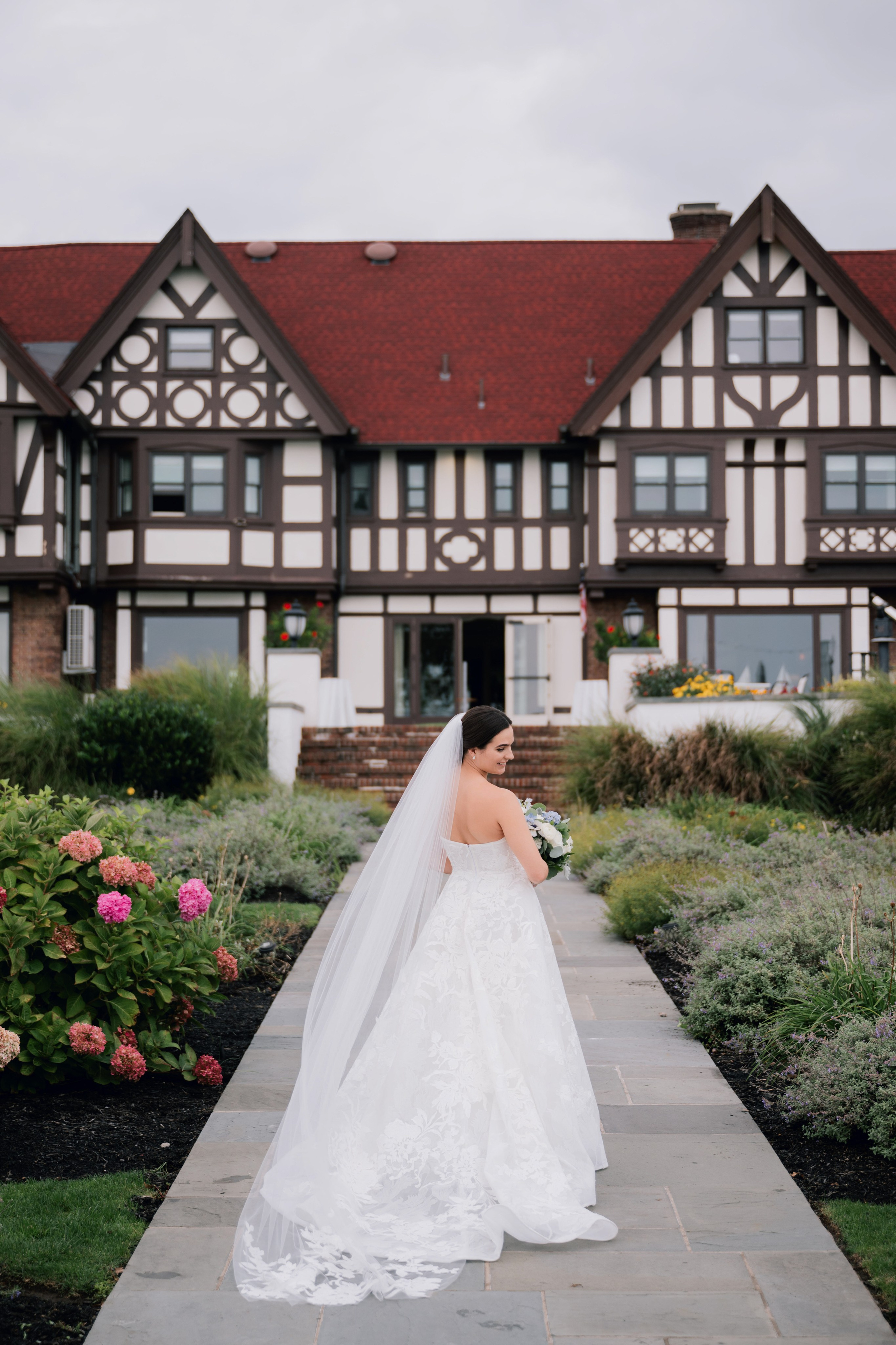 a bride in front of a house