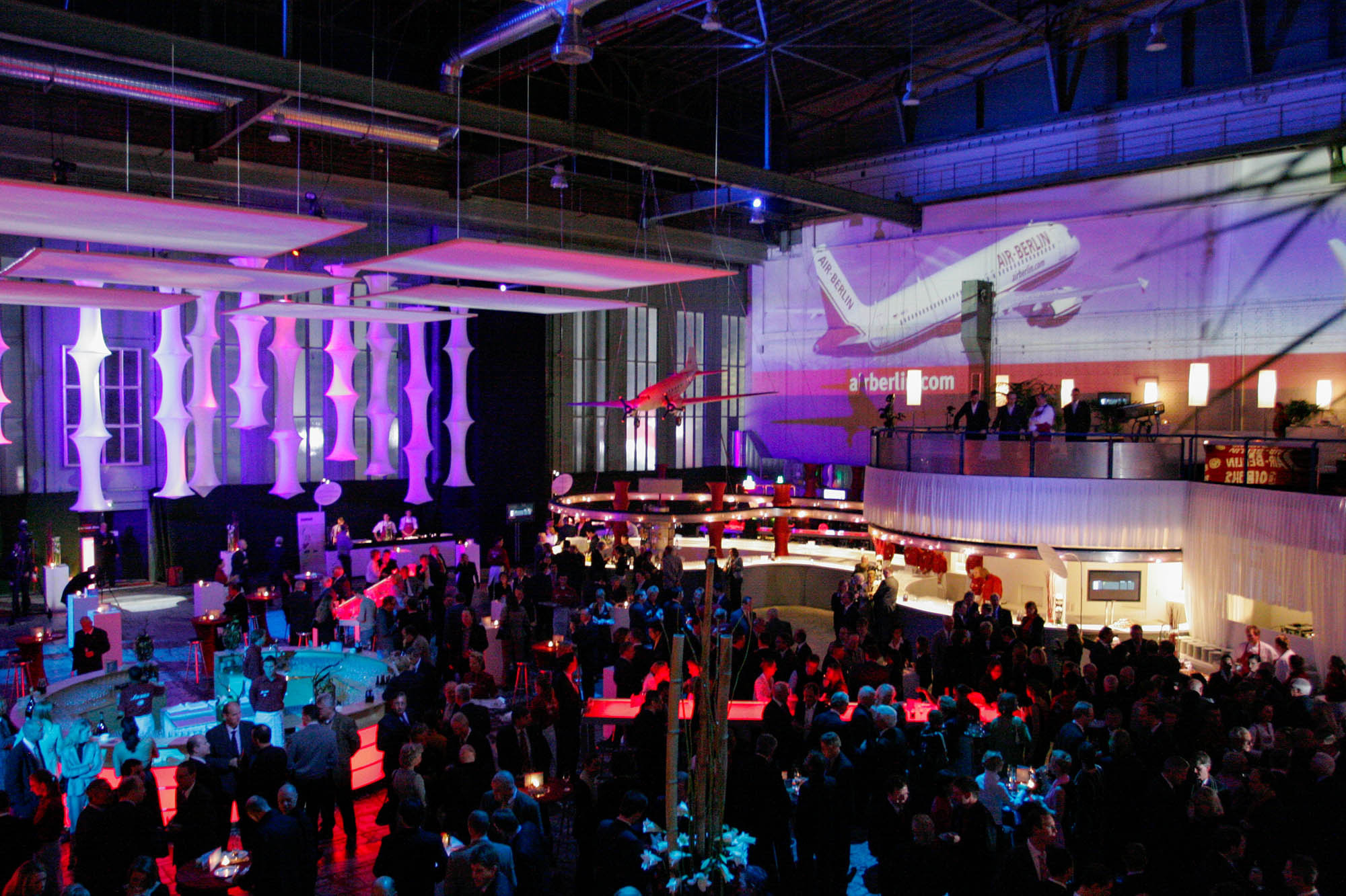 Photo showing the atmosphere of an Air Berlin event held at Templehof airport in Berlin.