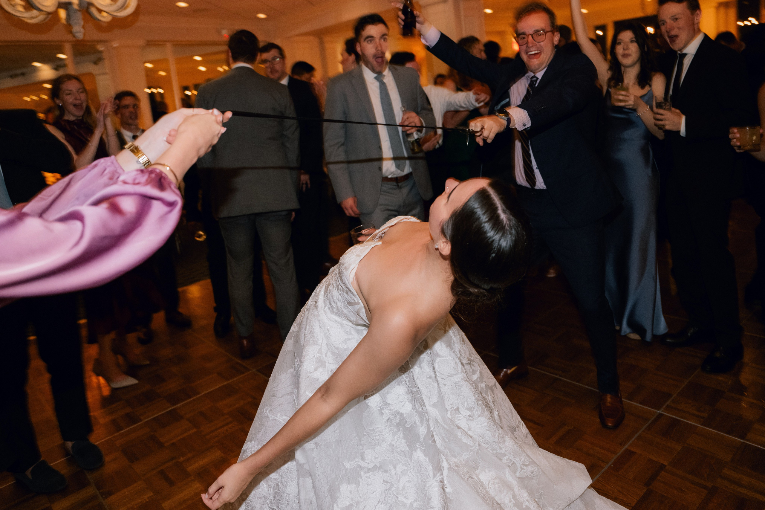 a bride and groom dancing on a dance floor