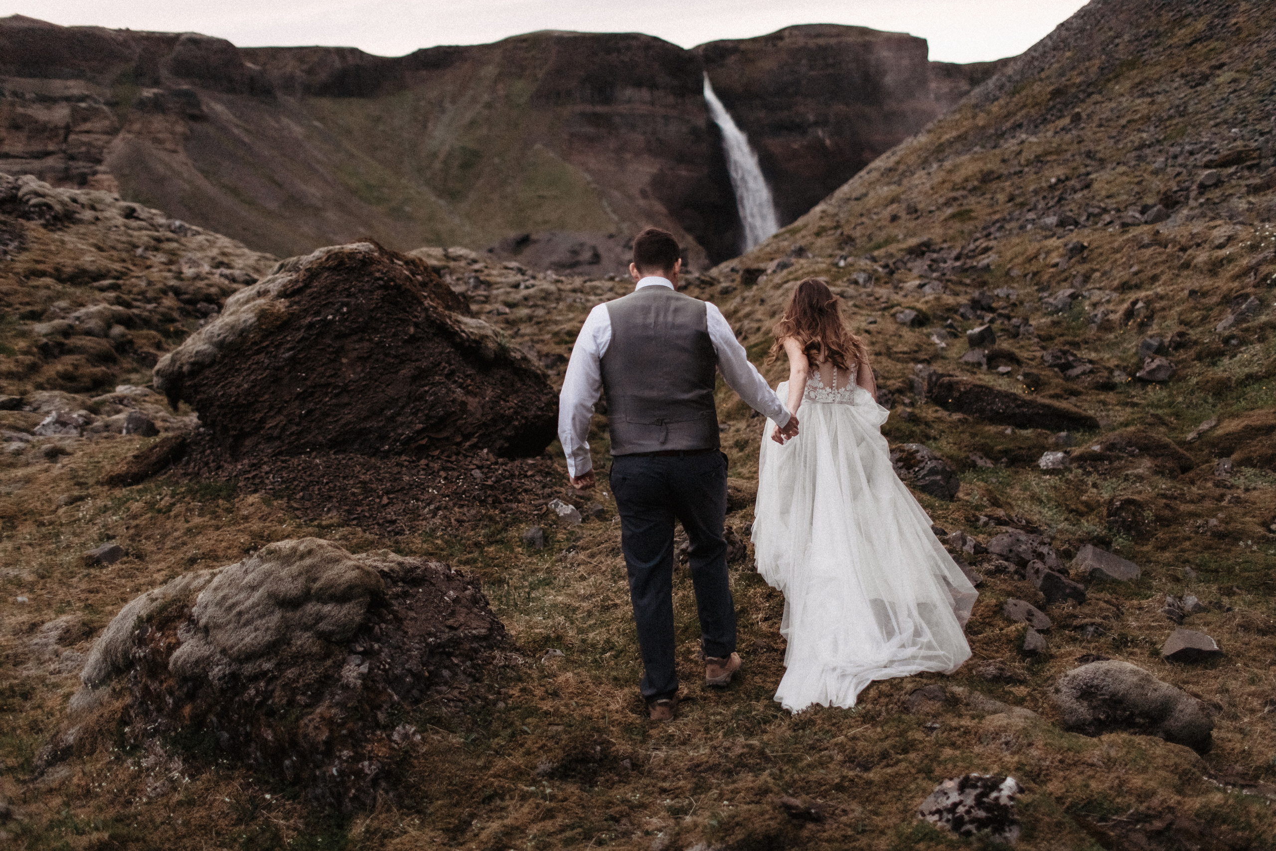 Midnight sun elopement at Haifoss in Iceland. Iceland elopement photographer & videographer