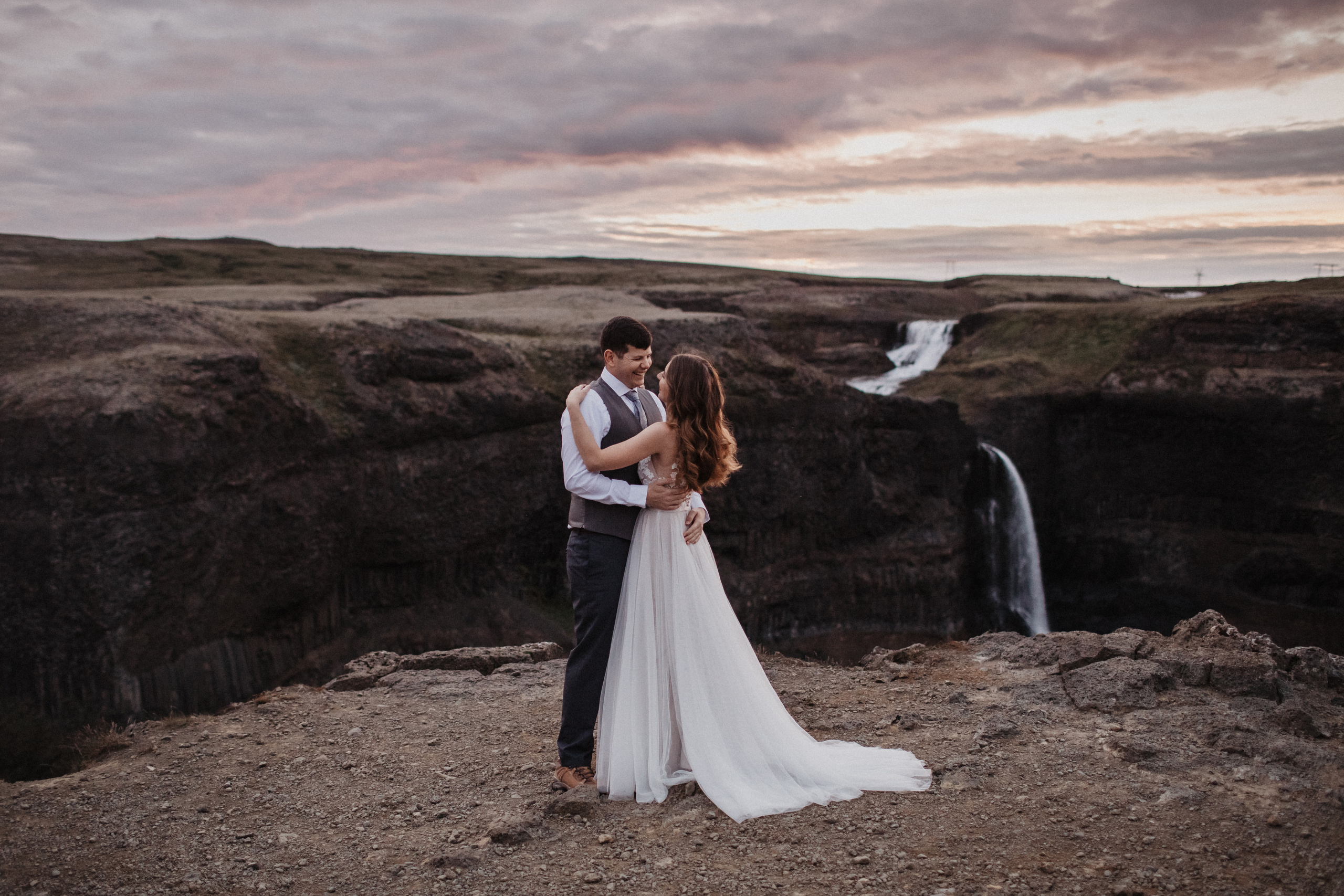 Midnight sun elopement at Haifoss in Iceland. Iceland elopement photographer & videographer