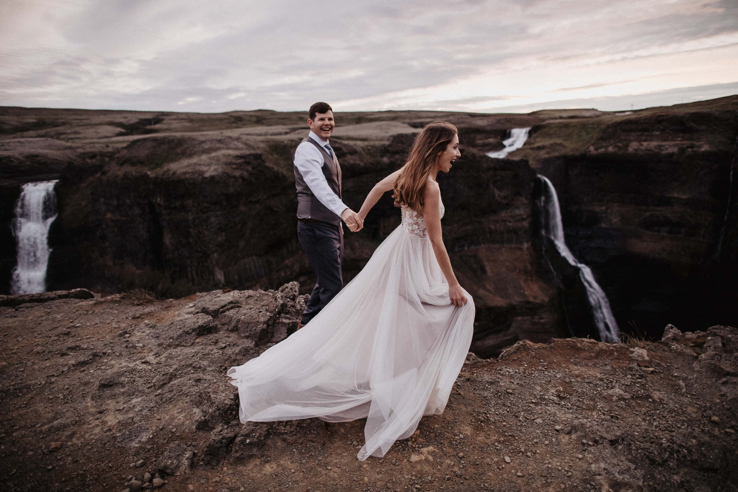 Midnight sun elopement at Haifoss in Iceland. Iceland elopement photographer & videographer