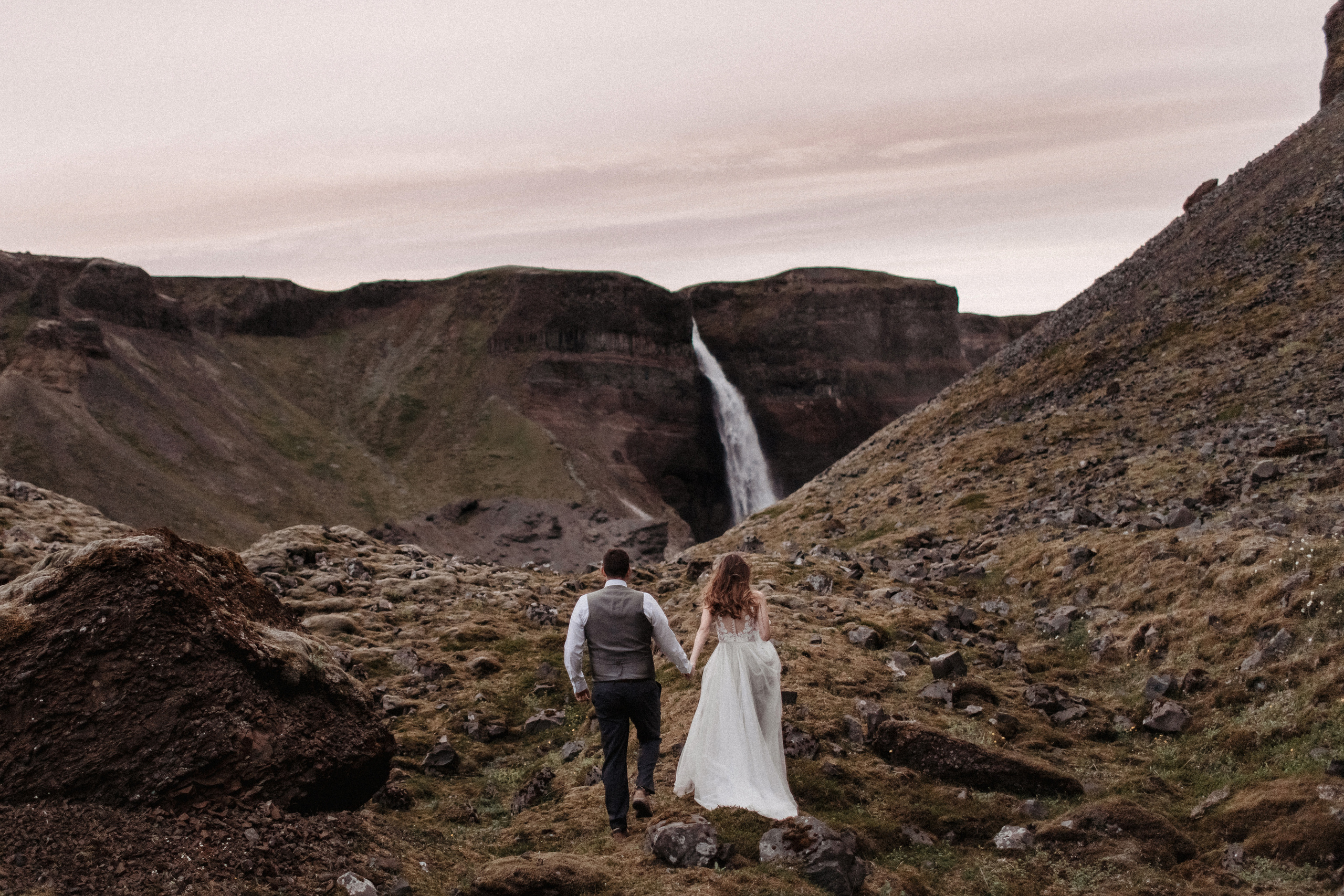 Midnight sun elopement at Haifoss in Iceland. Iceland elopement photographer & videographer