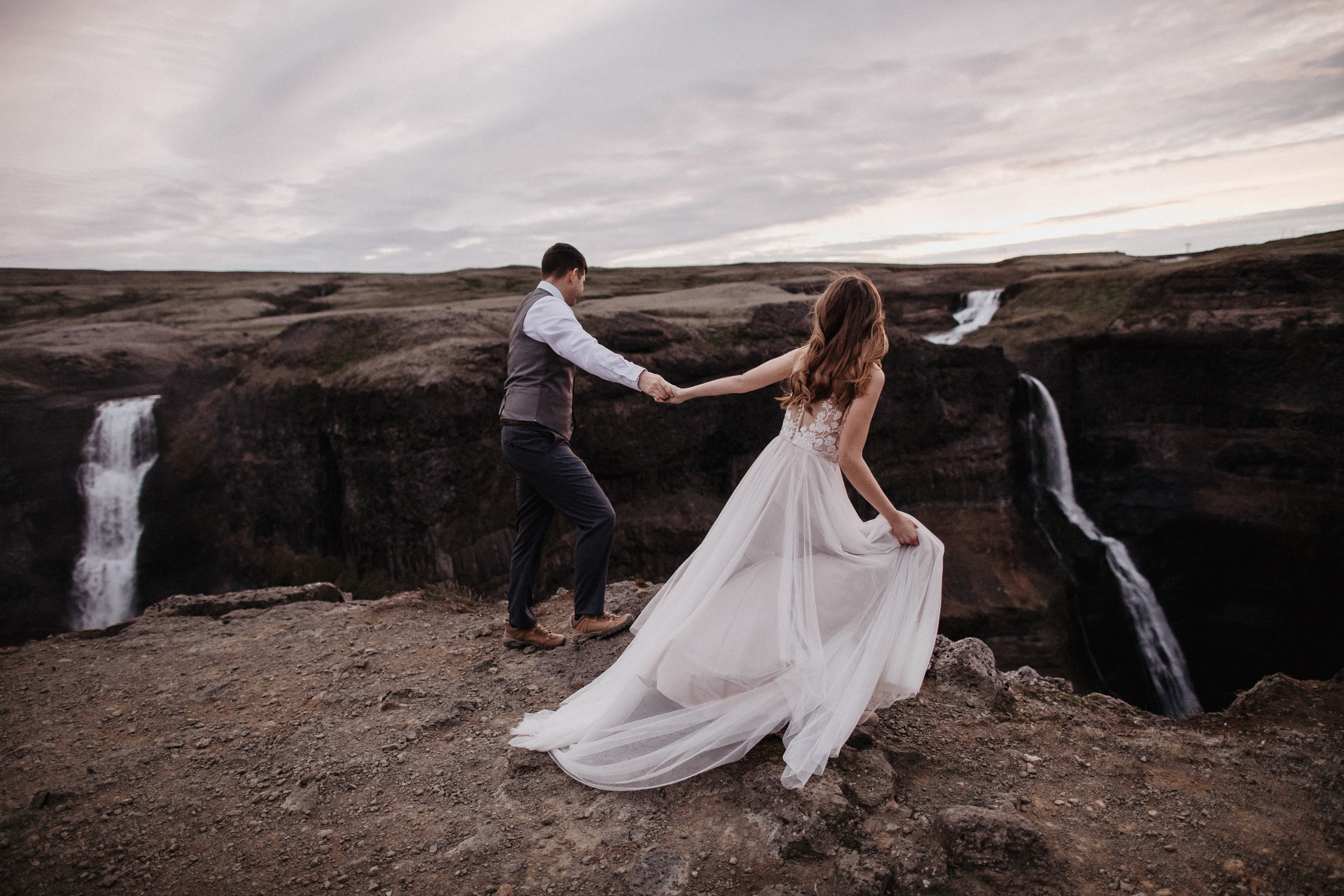 Midnight sun elopement at Haifoss in Iceland. Iceland elopement photographer & videographer