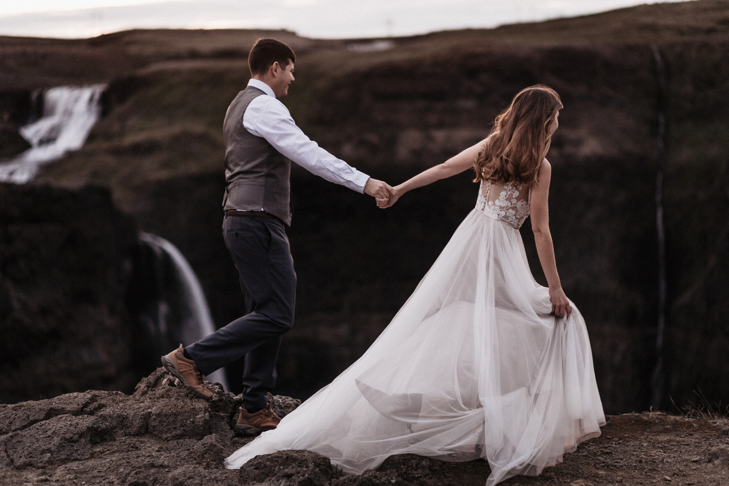 Midnight sun elopement at Haifoss in Iceland. Iceland elopement photographer & videographer
