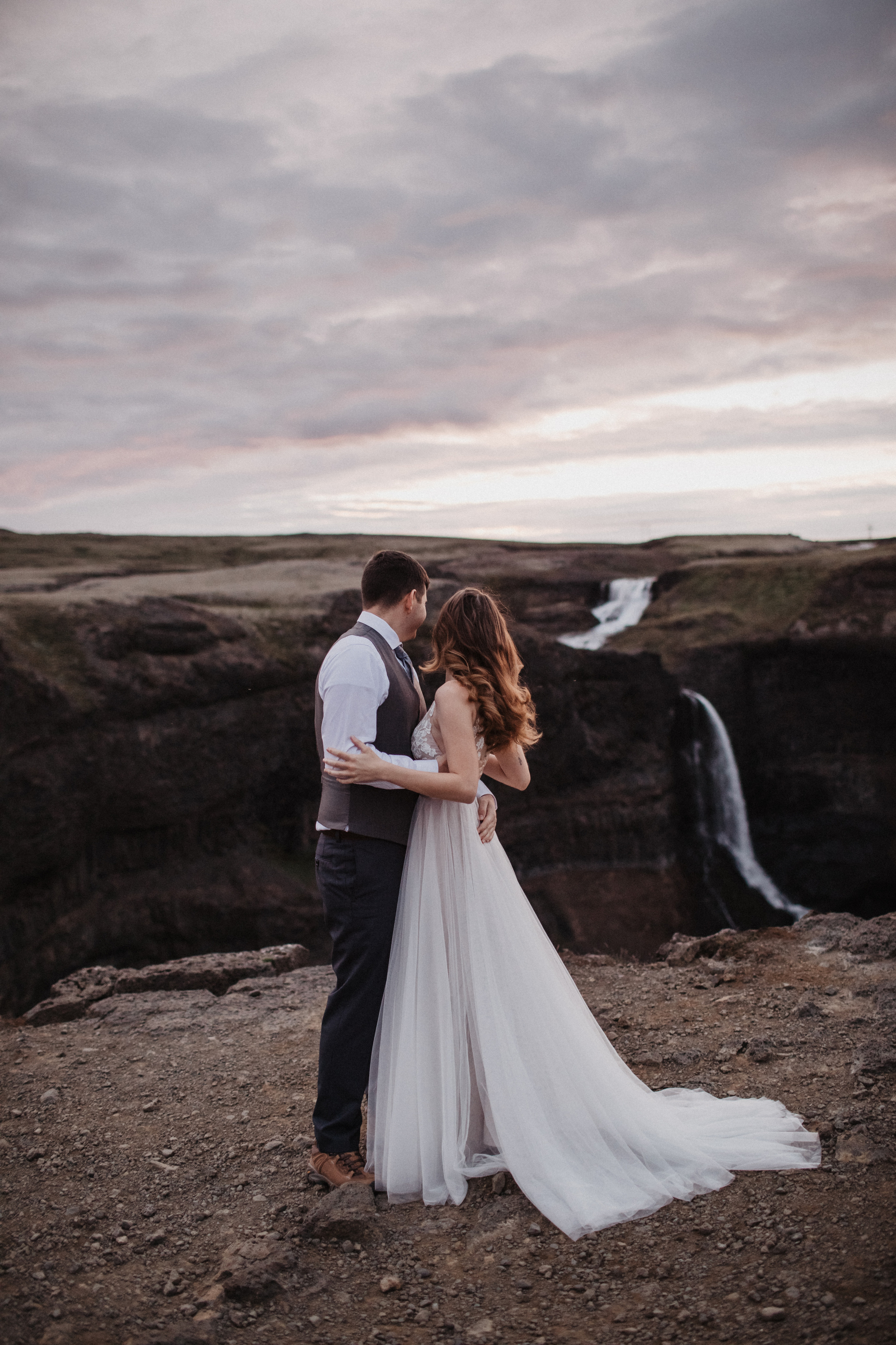 Midnight sun elopement at Haifoss in Iceland. Iceland elopement photographer & videographer