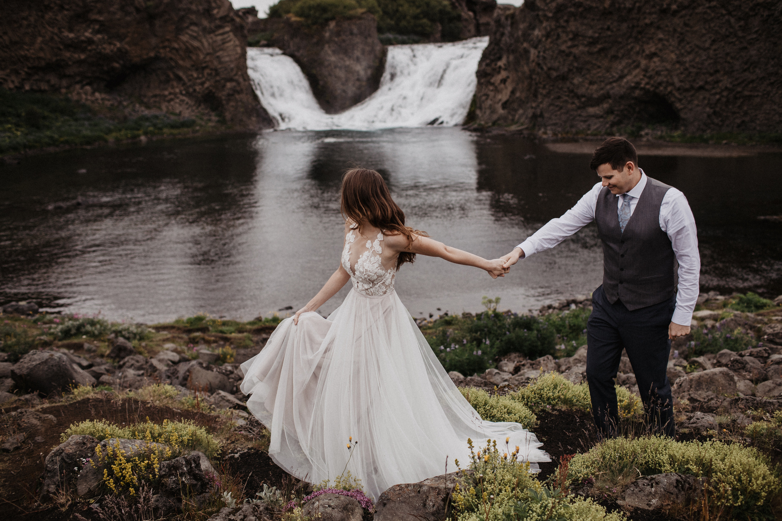 Midnight sun elopement at Haifoss in Iceland. Iceland elopement photographer & videographer