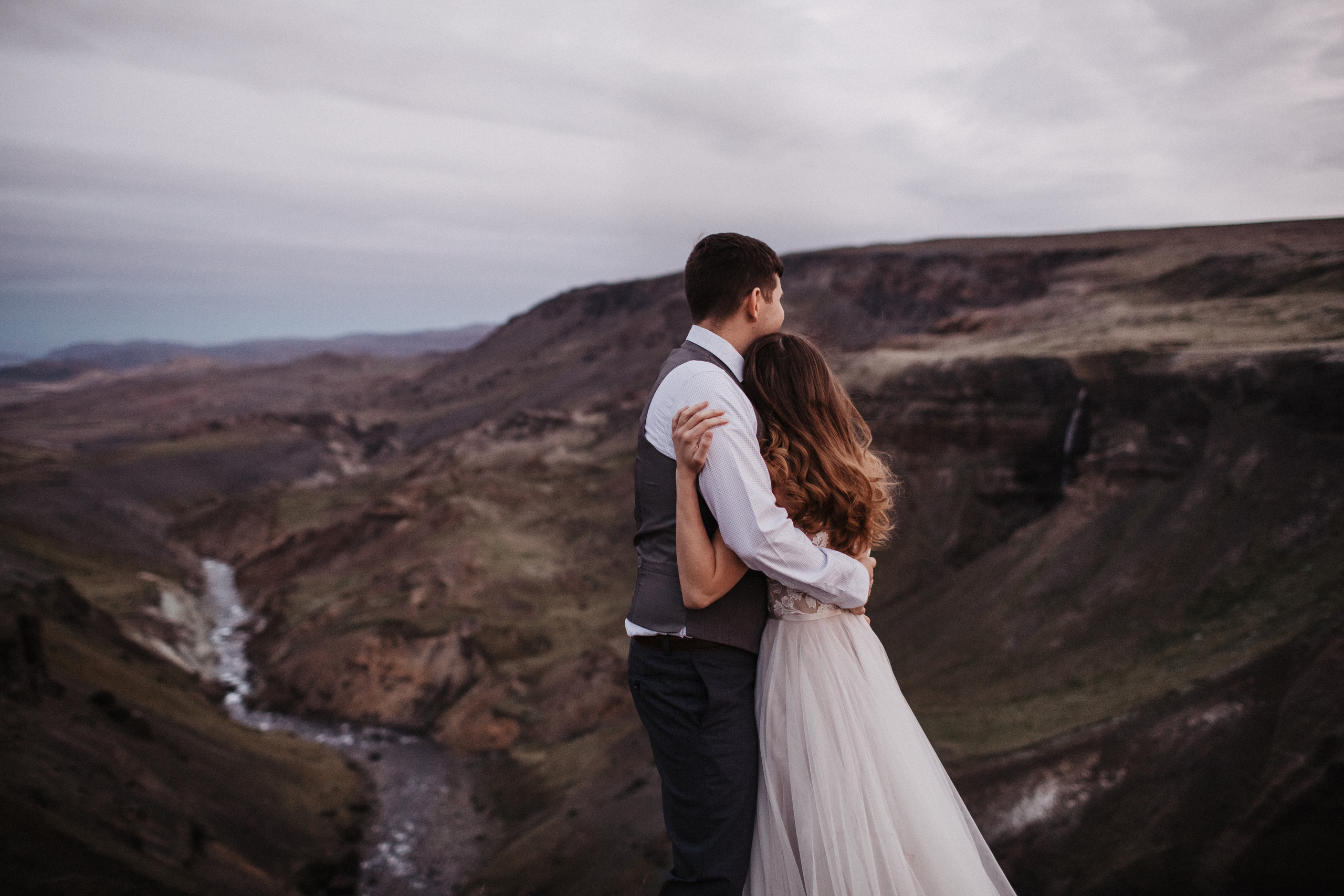 Midnight sun elopement at Haifoss in Iceland. Iceland elopement photographer & videographer