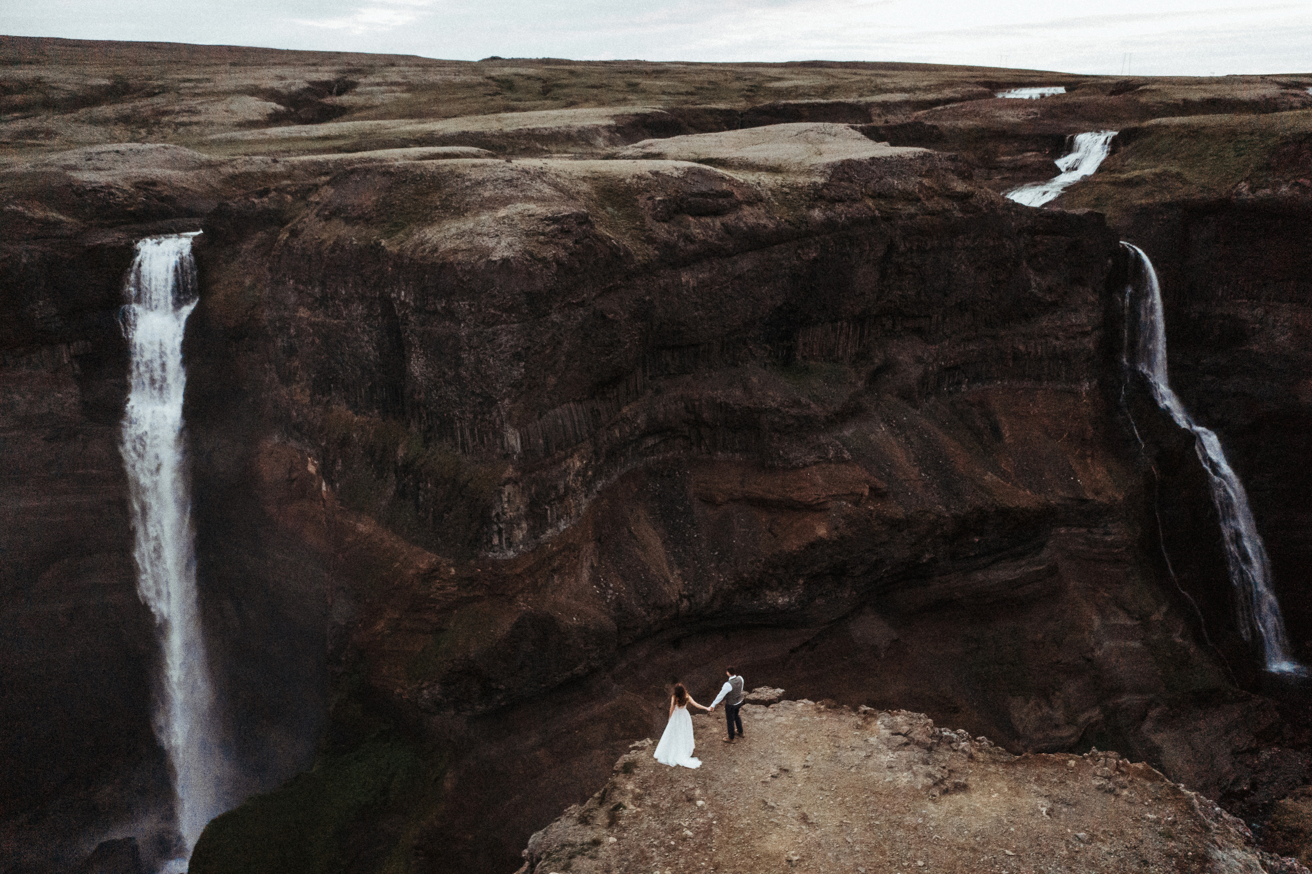 Midnight sun elopement at Haifoss in Iceland. Iceland elopement photographer & videographer