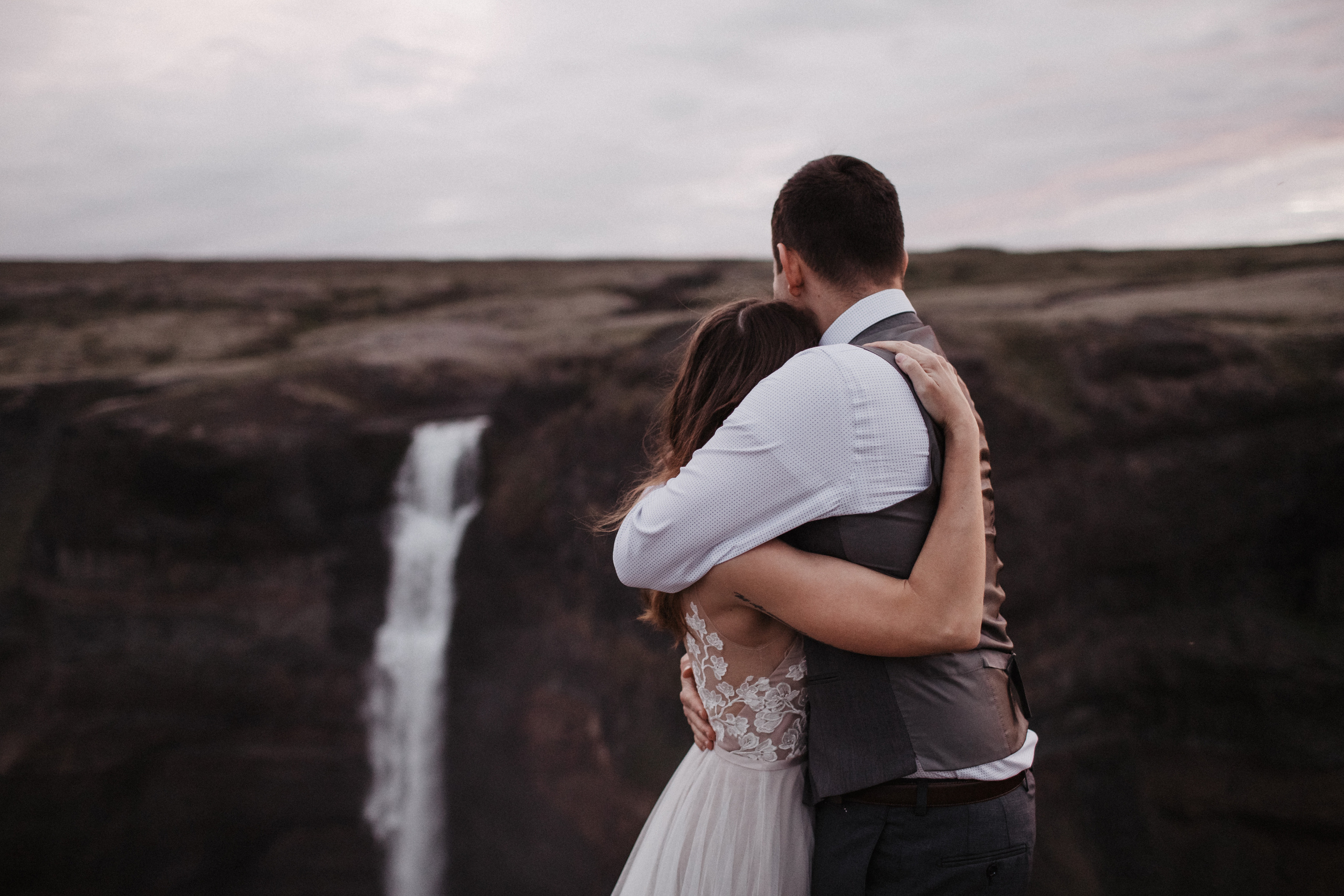 Midnight sun elopement at Haifoss in Iceland. Iceland elopement photographer & videographer